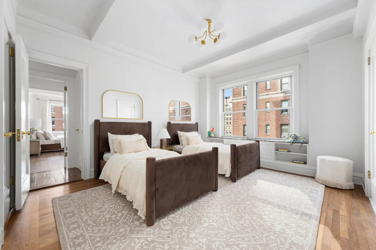 a bed room with bed and a large window