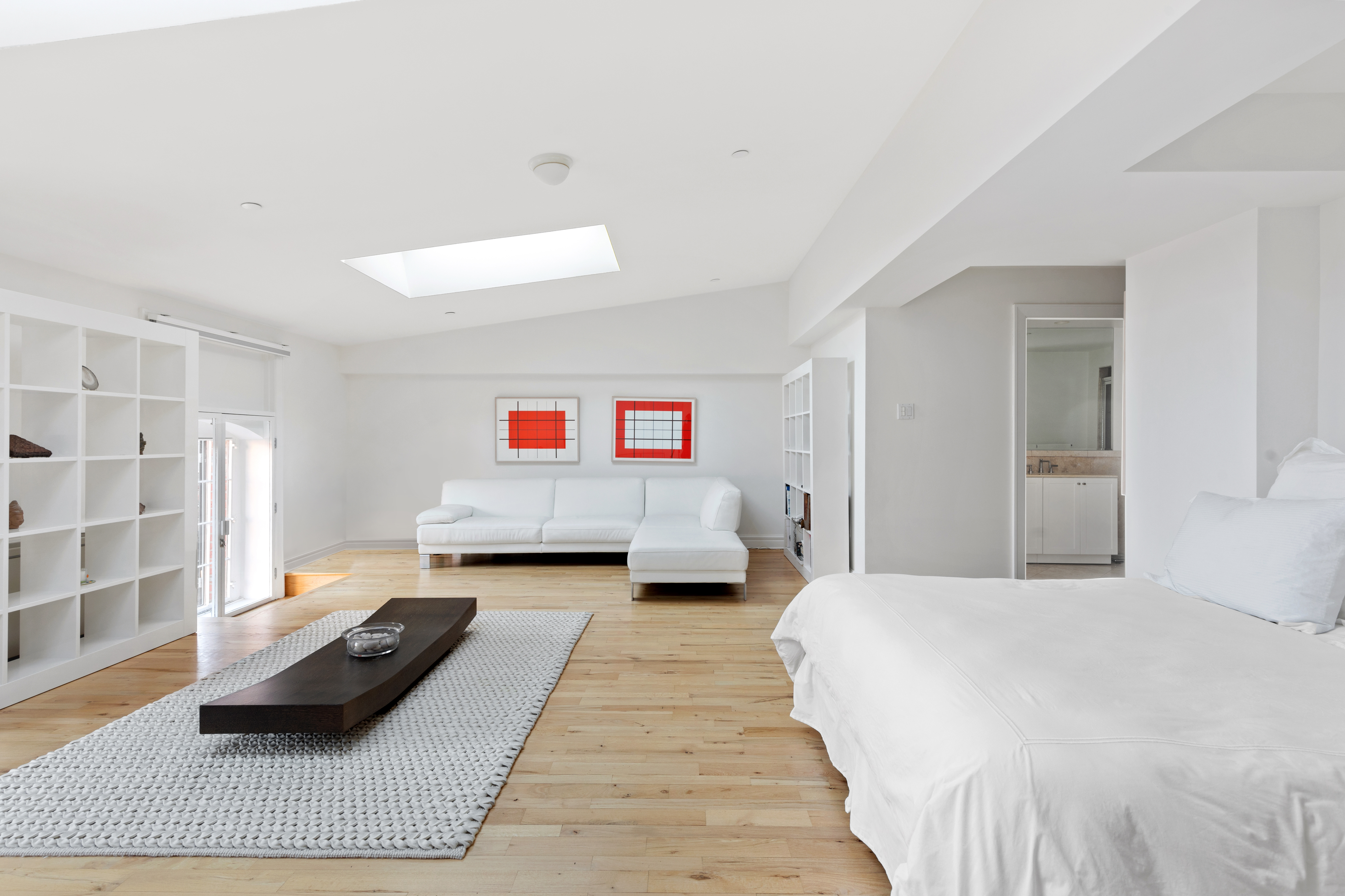 79 Laight Street, Unit 5H Manhattan, NY 10013 - Photo 7 of 13 a bedroom with a bed and a couch