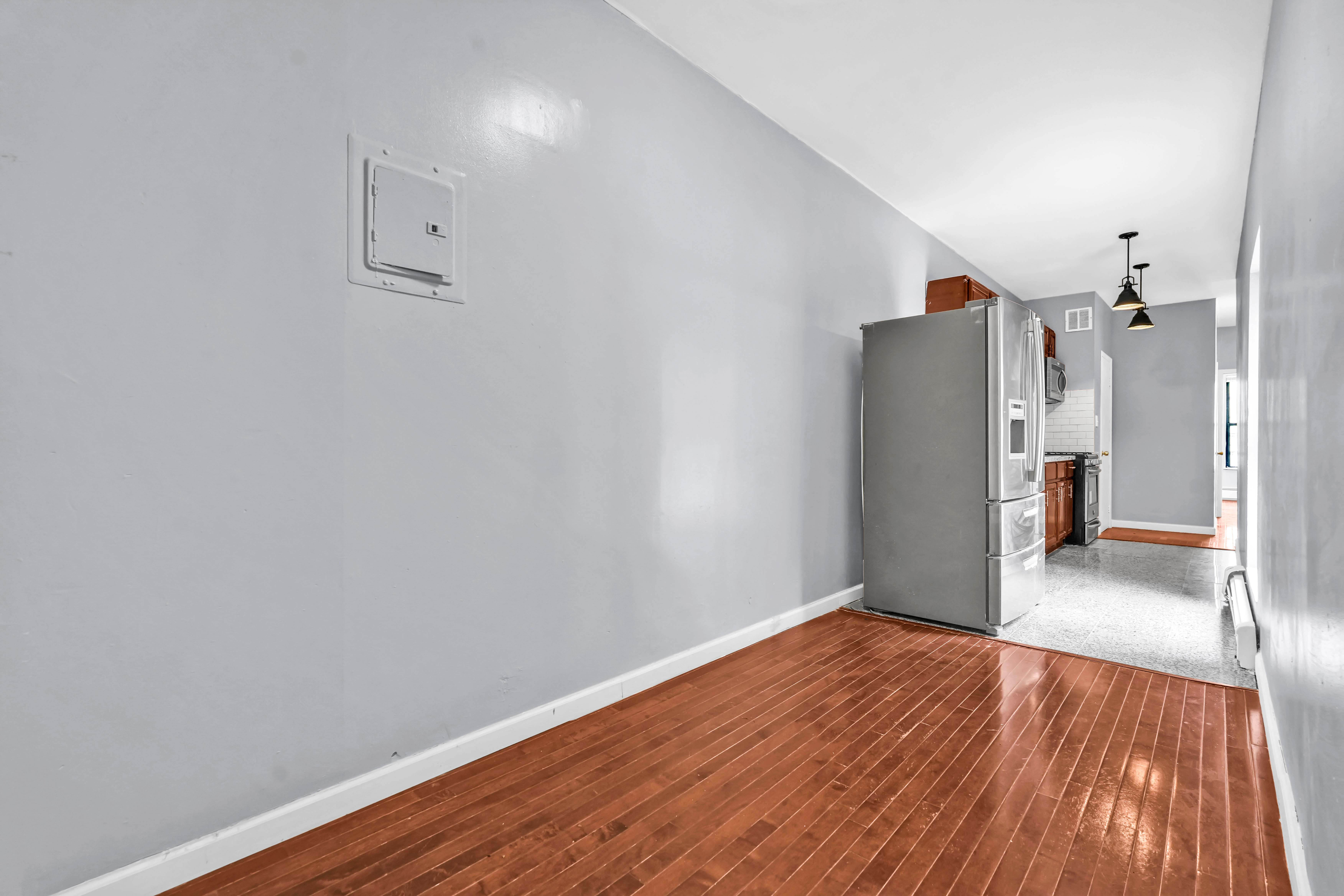 1633 St Johns Place, Unit 3 Brooklyn, NY 11233 - Photo 20 of 29 a view of empty room with wooden floor