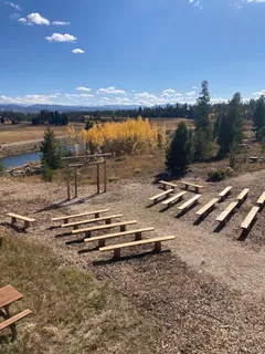 a kitchen with kitchen island a sink and cabinets
