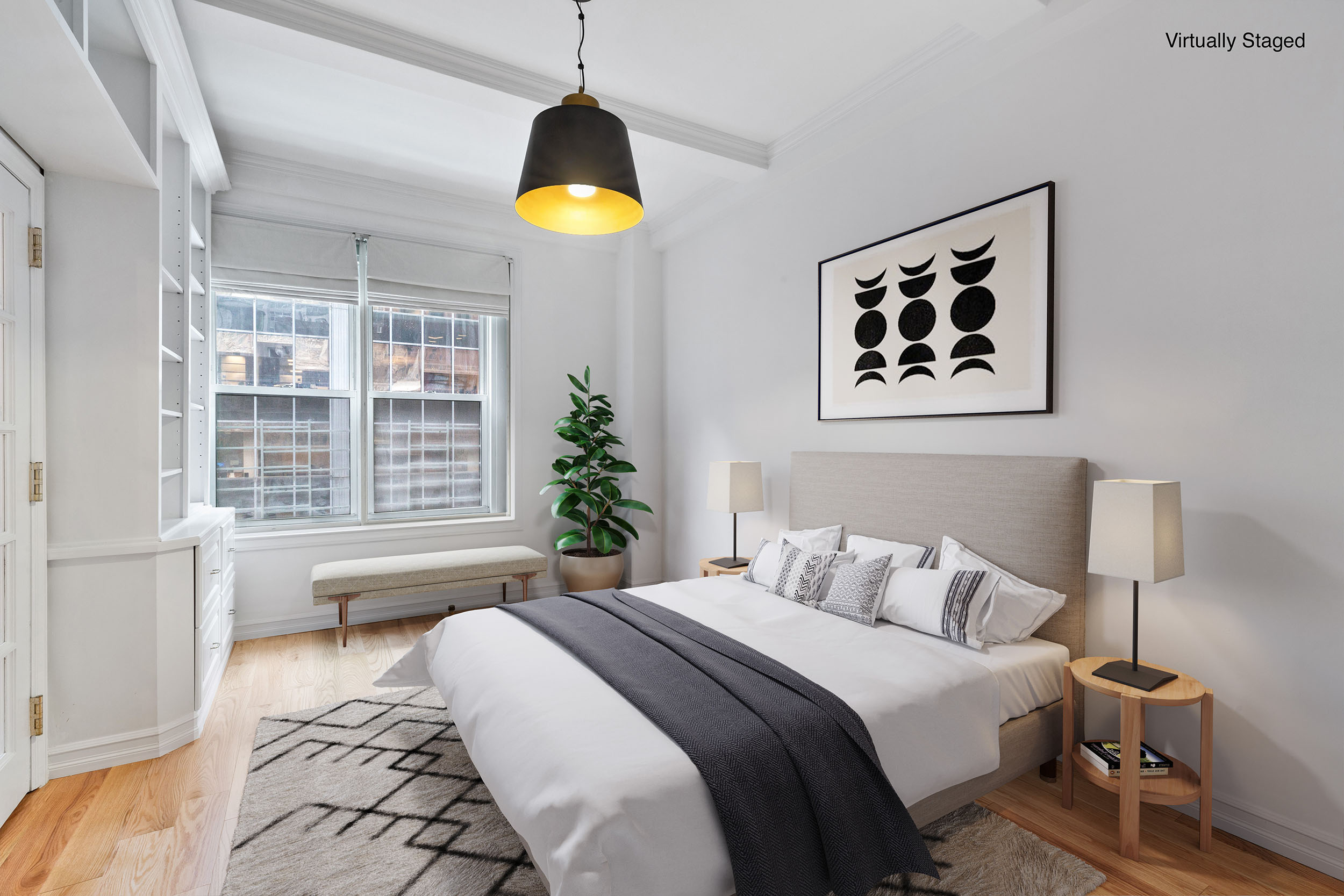 150 East 49th Street, Unit 8B Manhattan, NY 10017 - Photo 5 of 8 a bedroom with a bed and a window