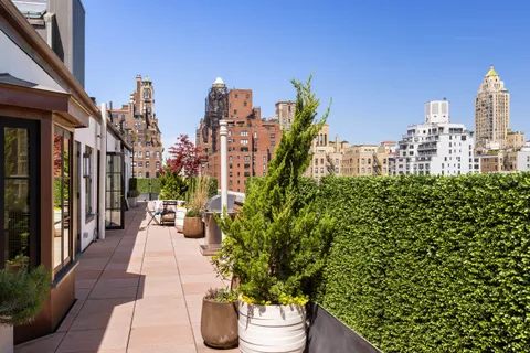 a view of a city with tall buildings