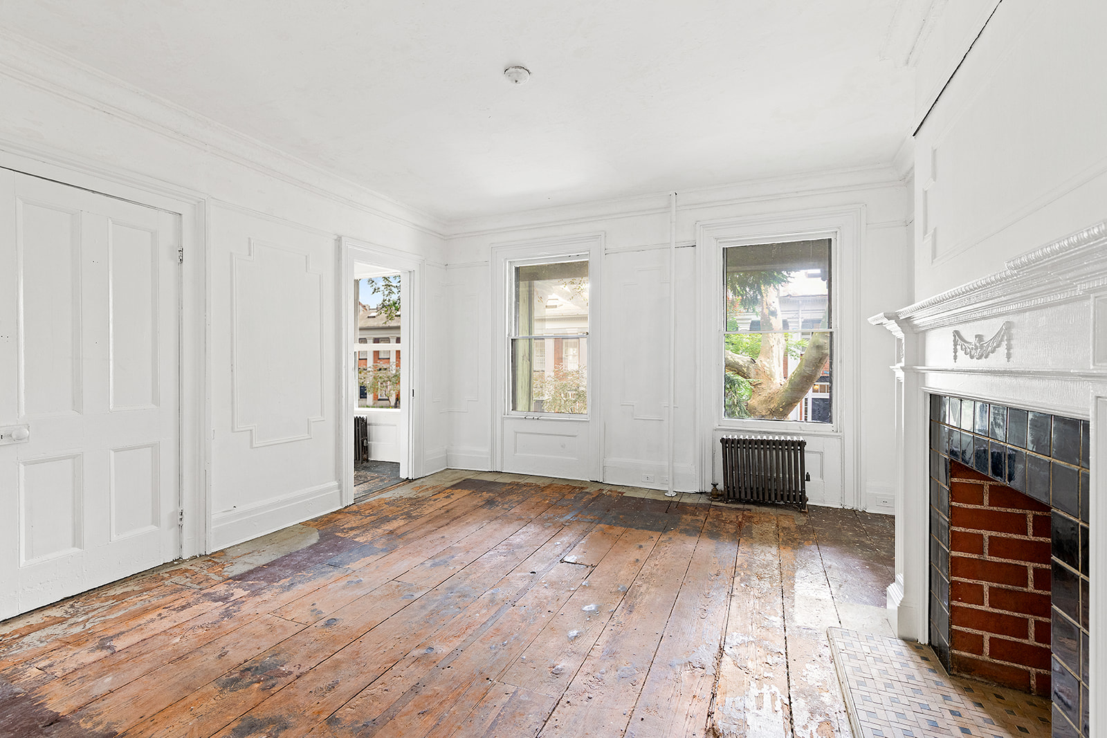46 Willow Place Brooklyn, NY 11201 - Photo 12 of 31 a view of empty room with wooden floor and fan