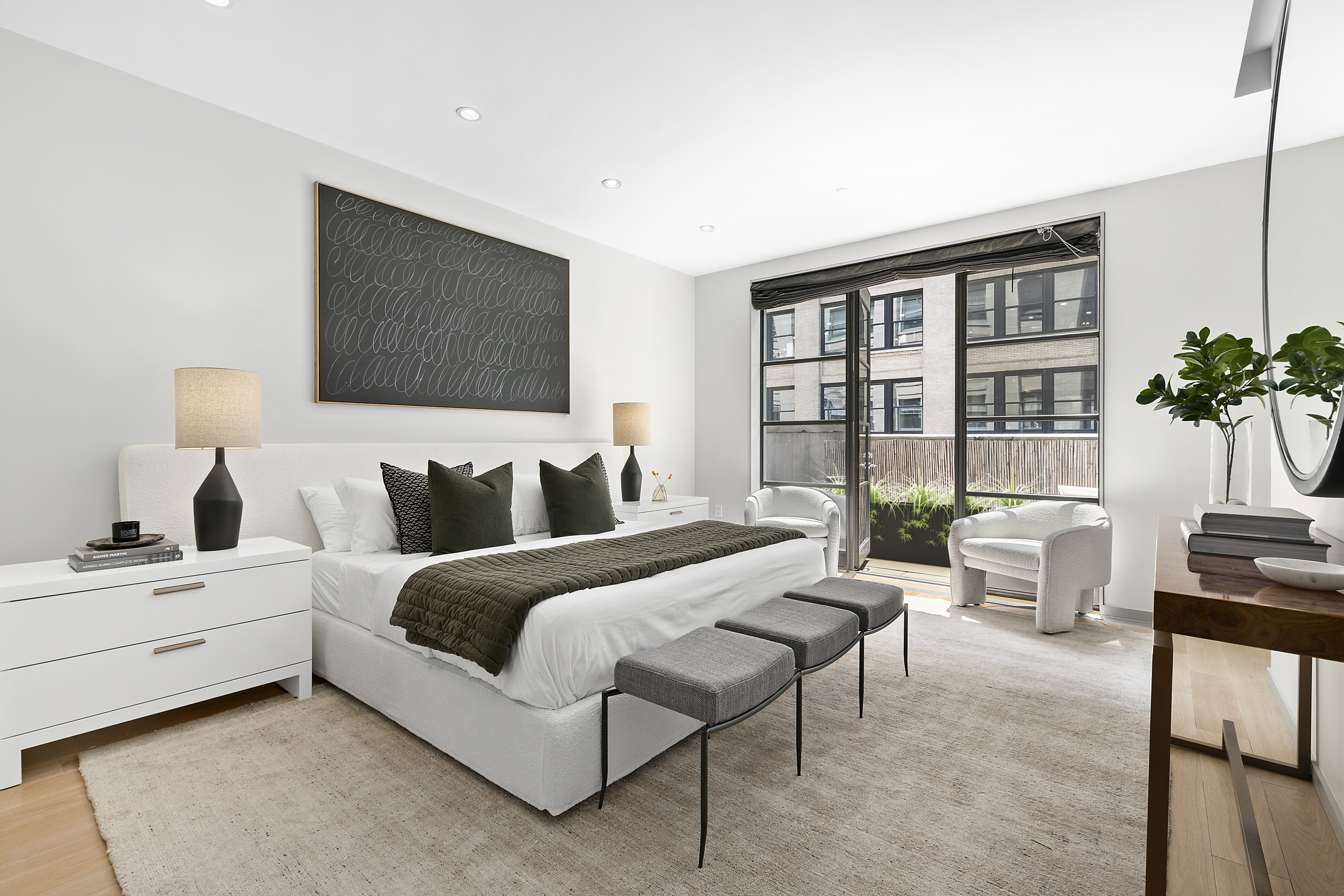 29 West 21st Street, Unit PH Manhattan, NY 10010 - Photo 5 of 17 a spacious bedroom with a bed and a couch