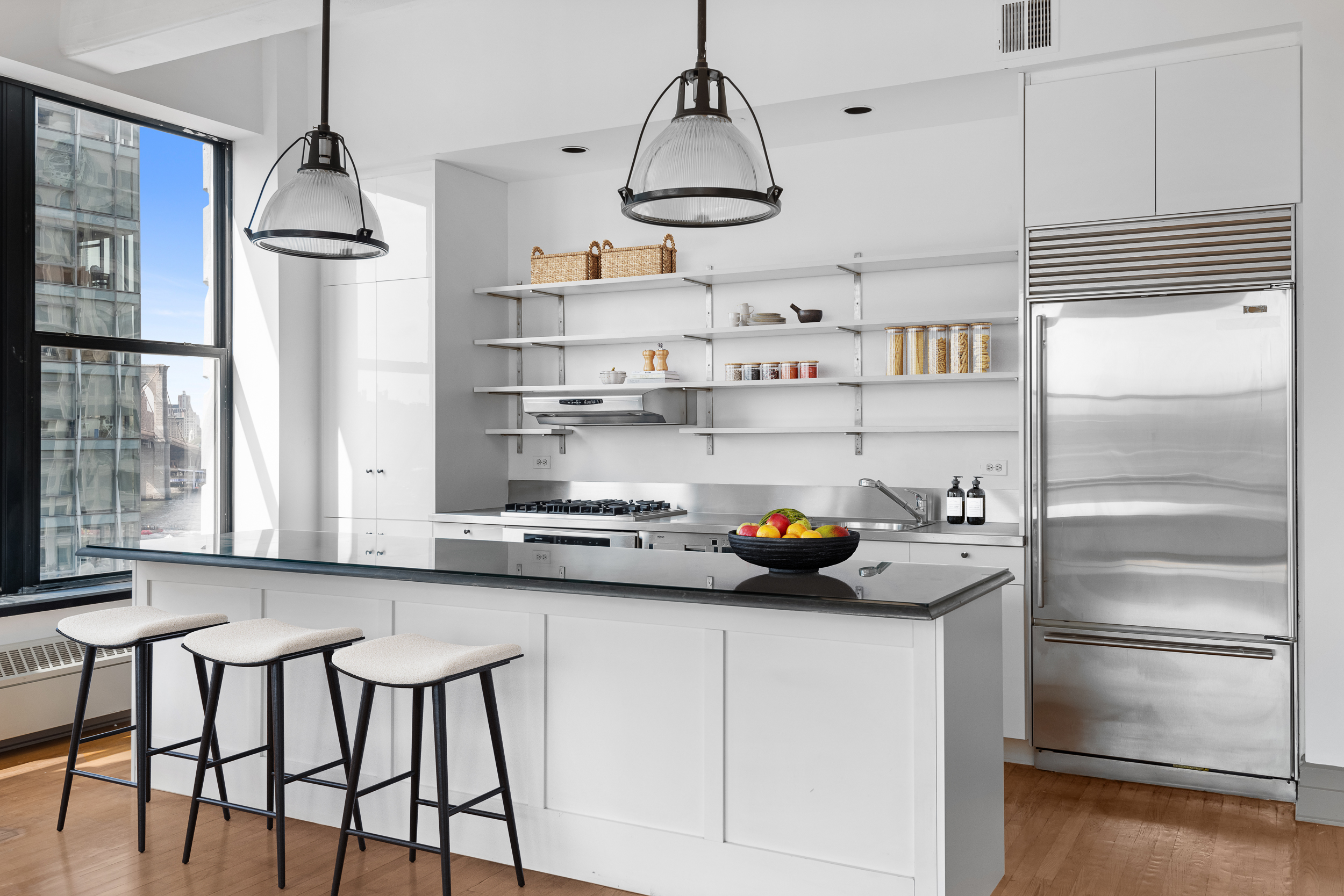30 Main Street, Unit 10F Brooklyn, NY 11201 - Photo 4 of 16 a kitchen with refrigerator and cabinets