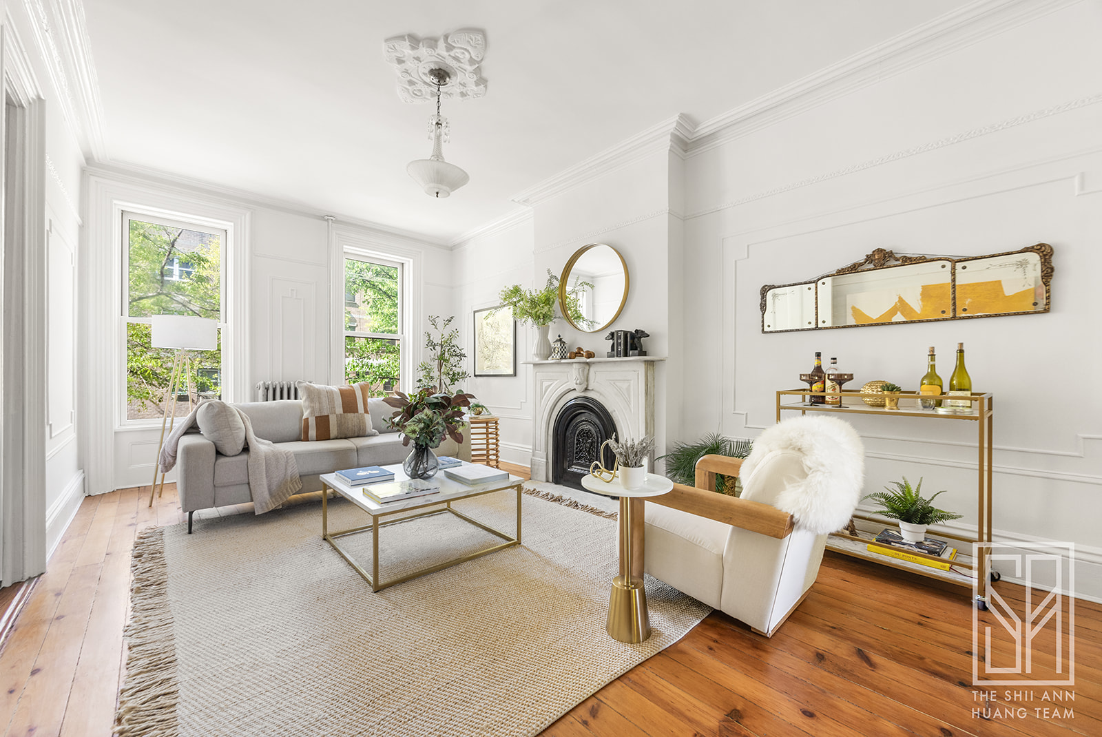 195 A 8th Street Brooklyn, NY 11215 - Photo 3 of 26 a living room with furniture a fireplace and a large window