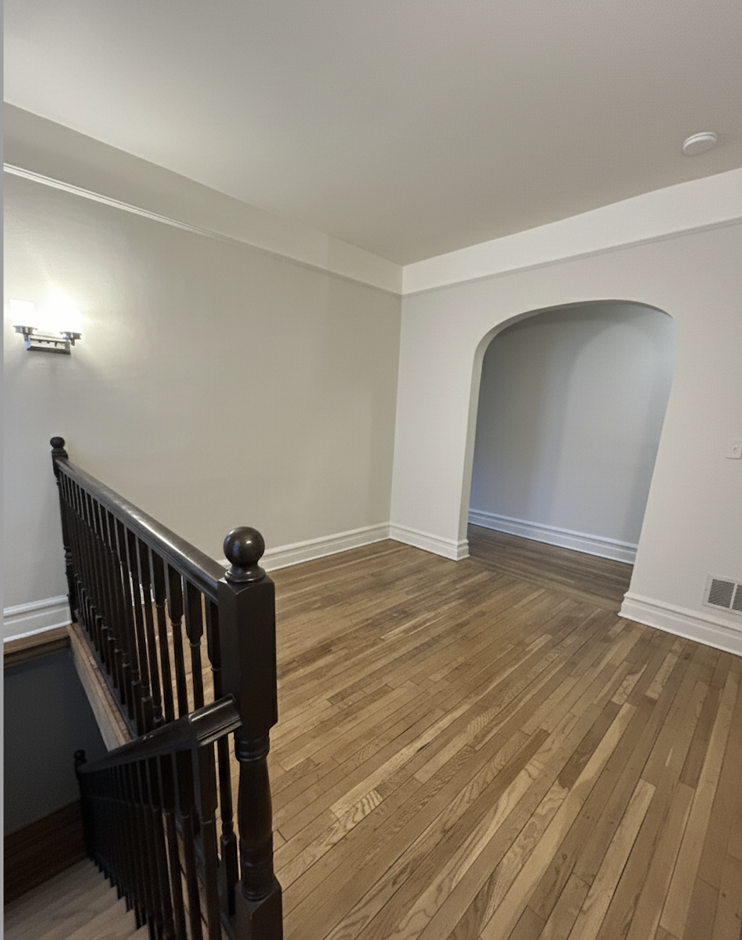 408 8th Avenue, Unit 1C Brooklyn, NY 11215 - Photo 7 of 13 a view of an empty room with wooden floor and a window