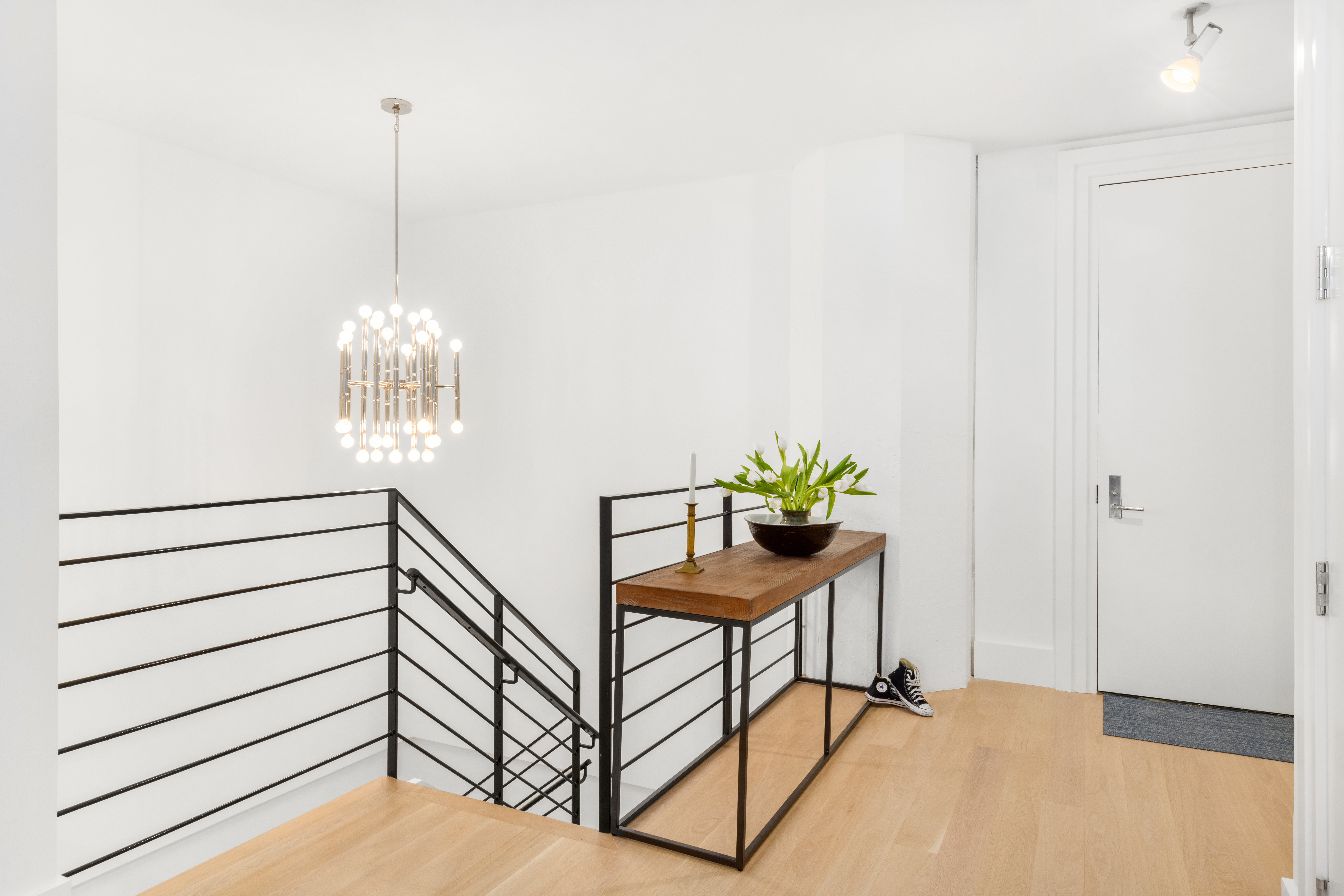 70 Washington Street, Unit 2K Brooklyn, NY 11201 - Photo 9 of 18 a view of a hallway with a table