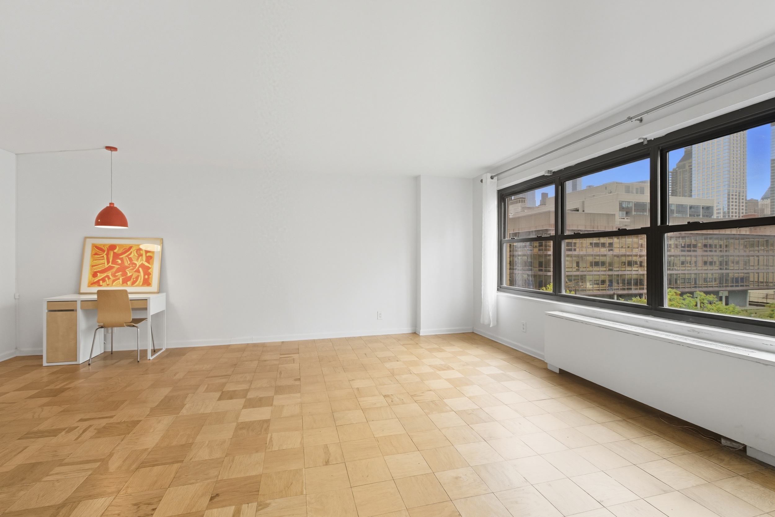 140 West End Avenue, Unit 6D Manhattan, NY 10023 - Photo 5 of 19 a view of an empty room with a window