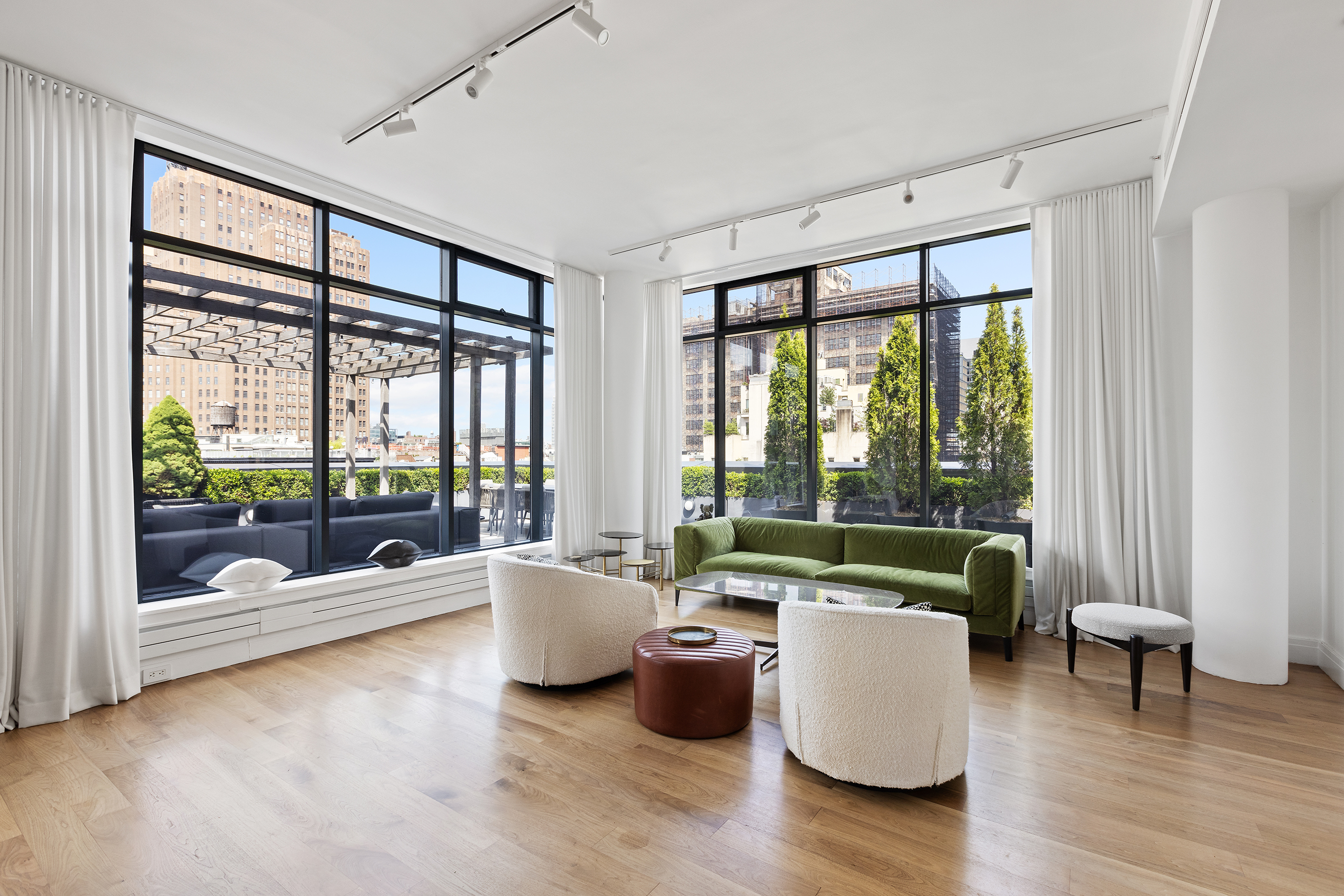 34 Leonard Street, Unit PH Manhattan, NY 10013 - Photo 2 of 30 a living room with furniture and a large window
