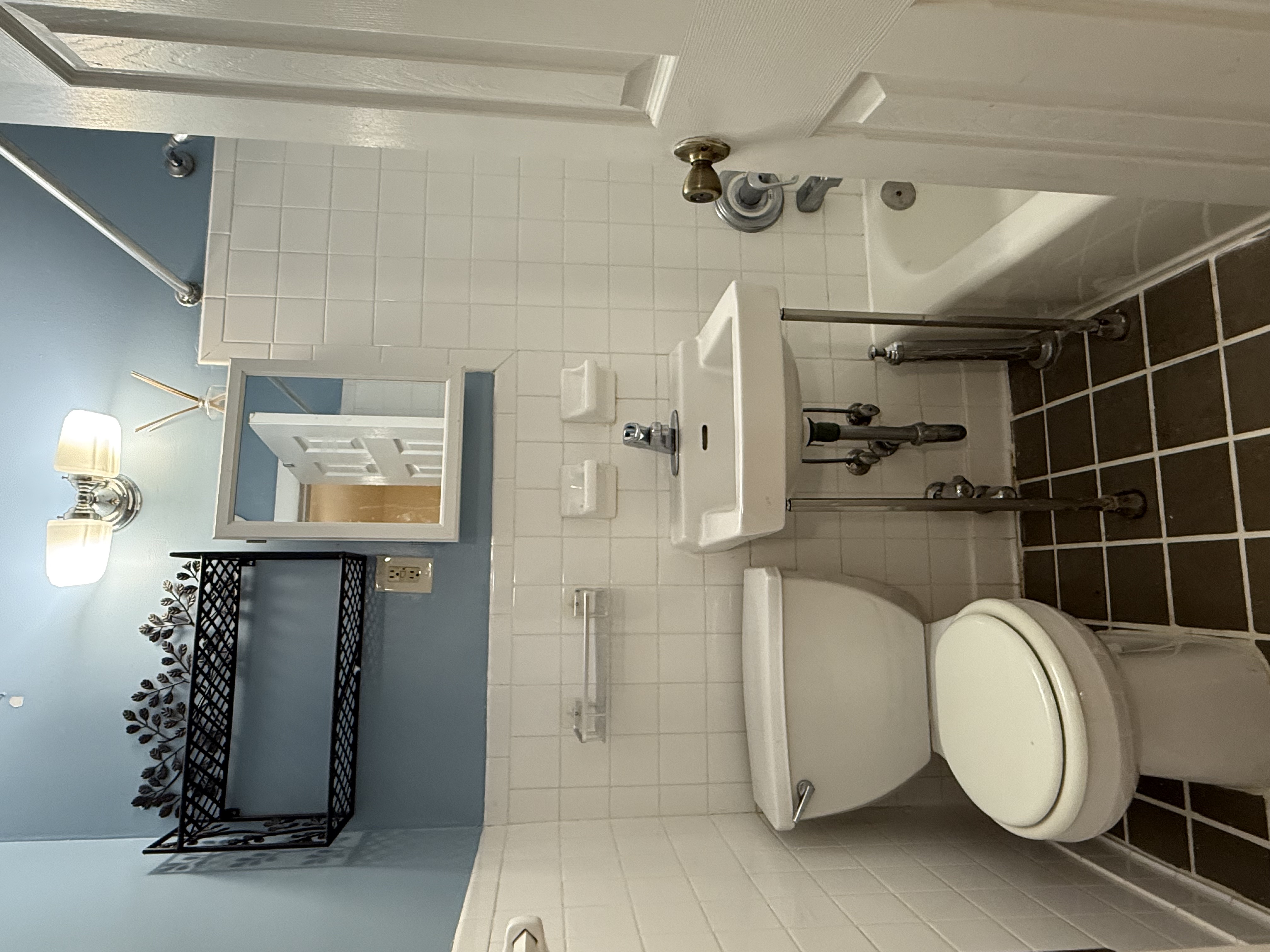 Park Avenue Manhattan, NY 10035 - Photo 6 of 14 a bathroom with a sink toilet and shower