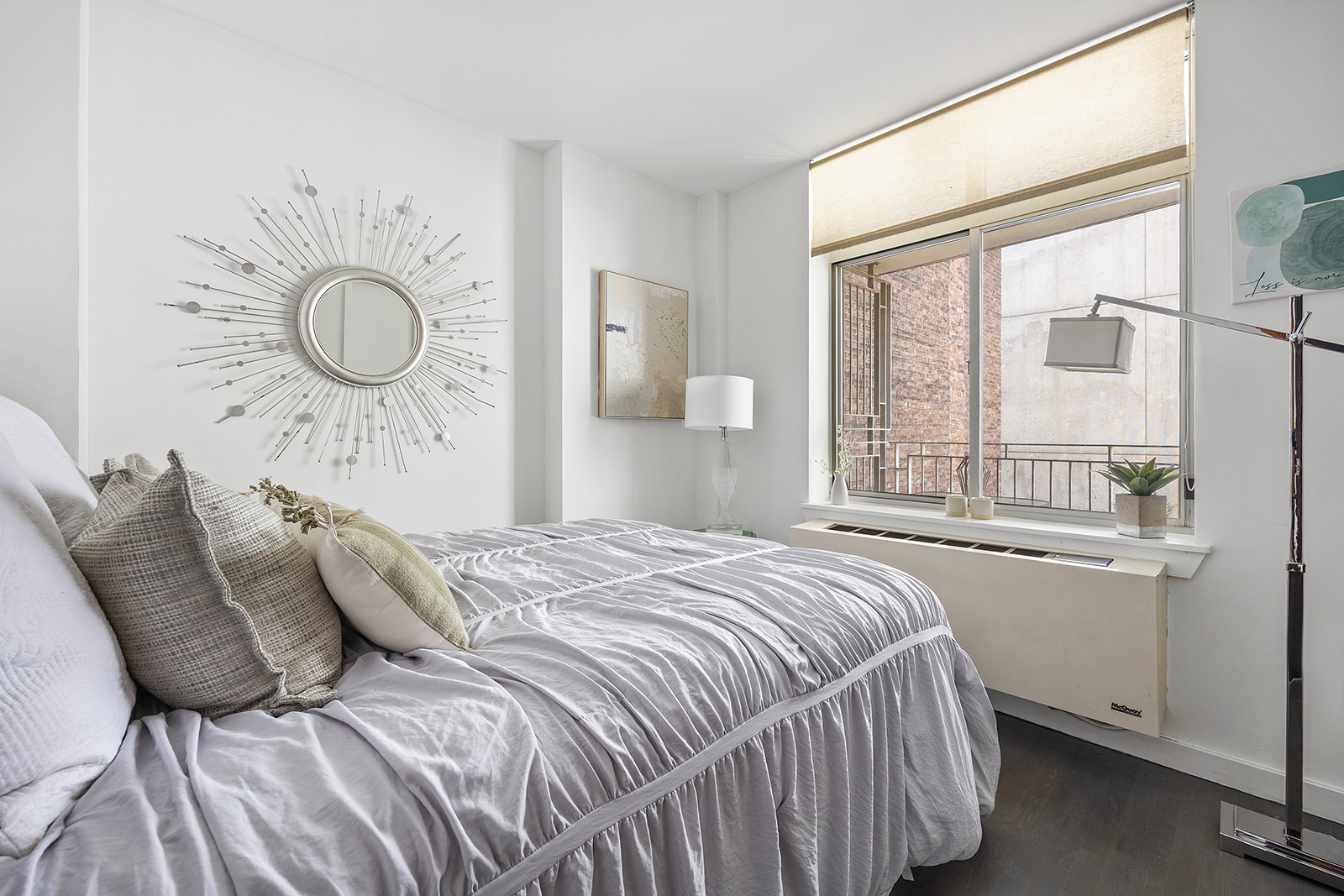 502 9th Avenue, Unit 4A Manhattan, NY 10018 - Photo 3 of 9 a bedroom with a bed and a window