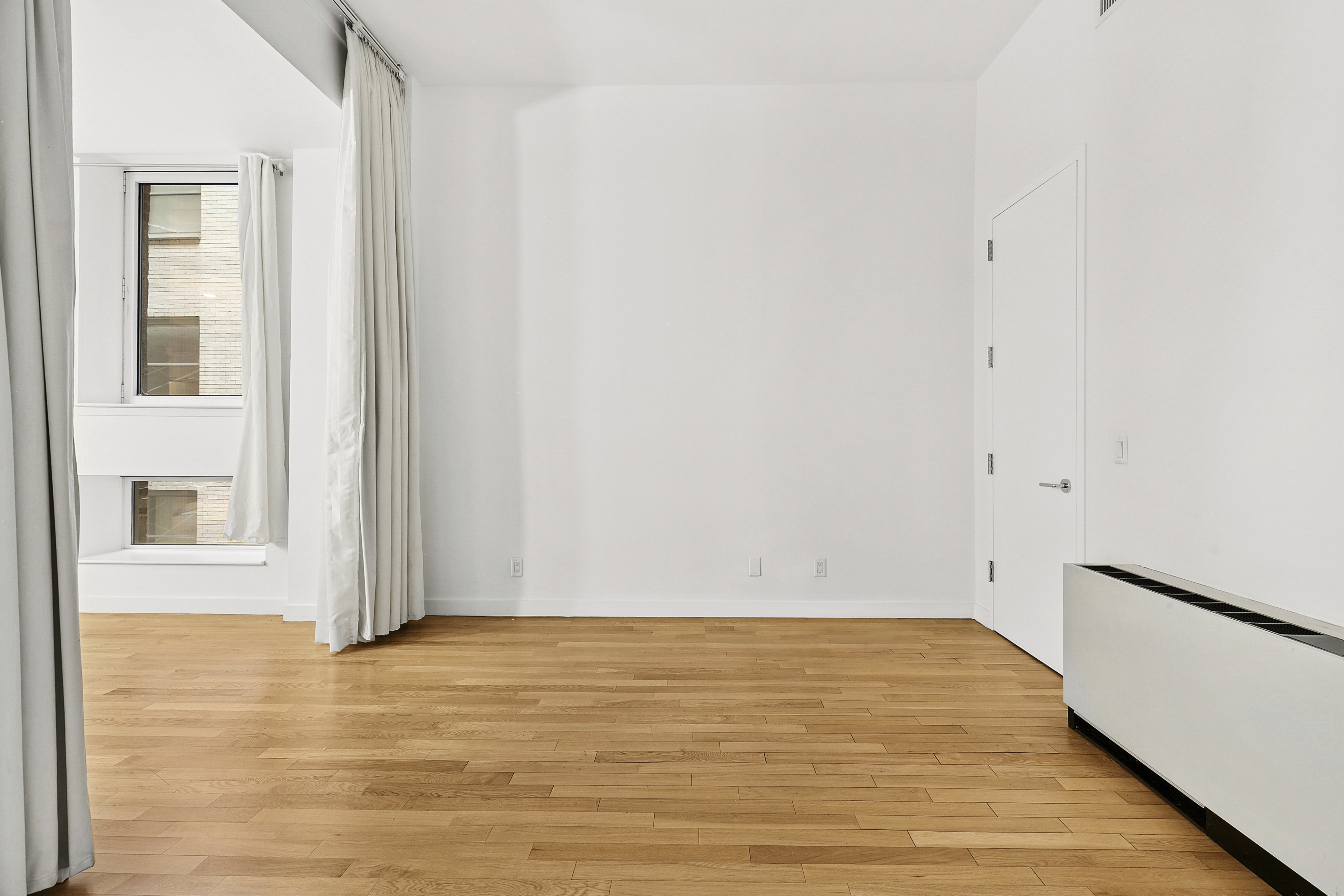 59 John Street, Unit 4H Manhattan, NY 10038 - Photo 9 of 19 a view of an empty room