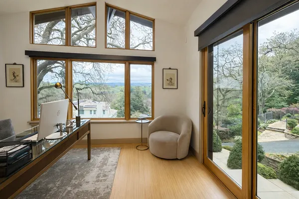 a room with furniture and a large window