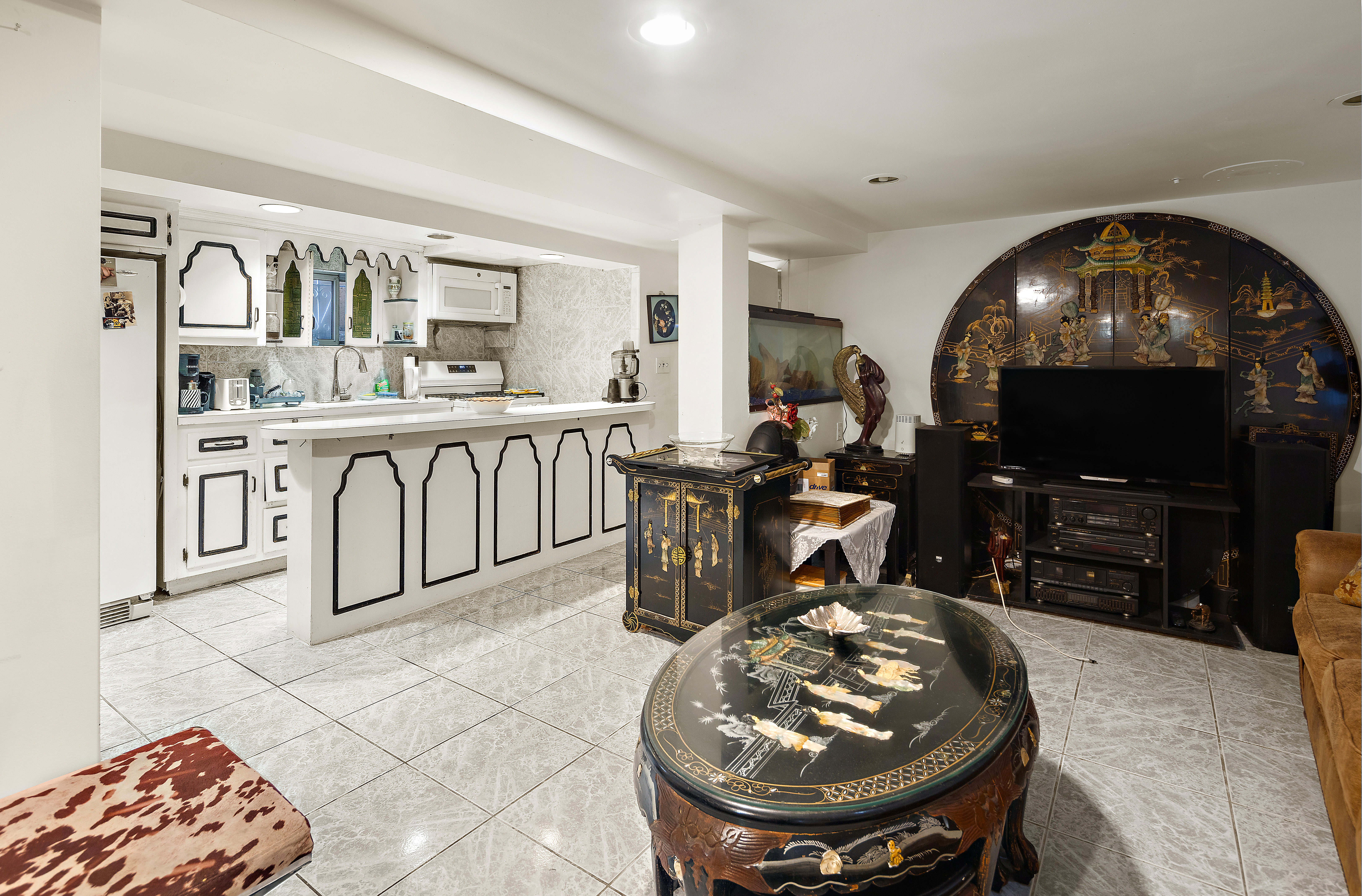 562 84th Street Brooklyn, NY 11209 - Photo 12 of 25 a kitchen with sink and view of living room
