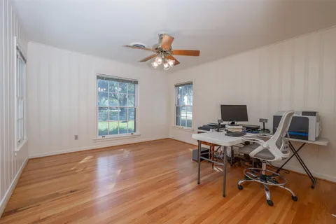 a workspace with wooden floor