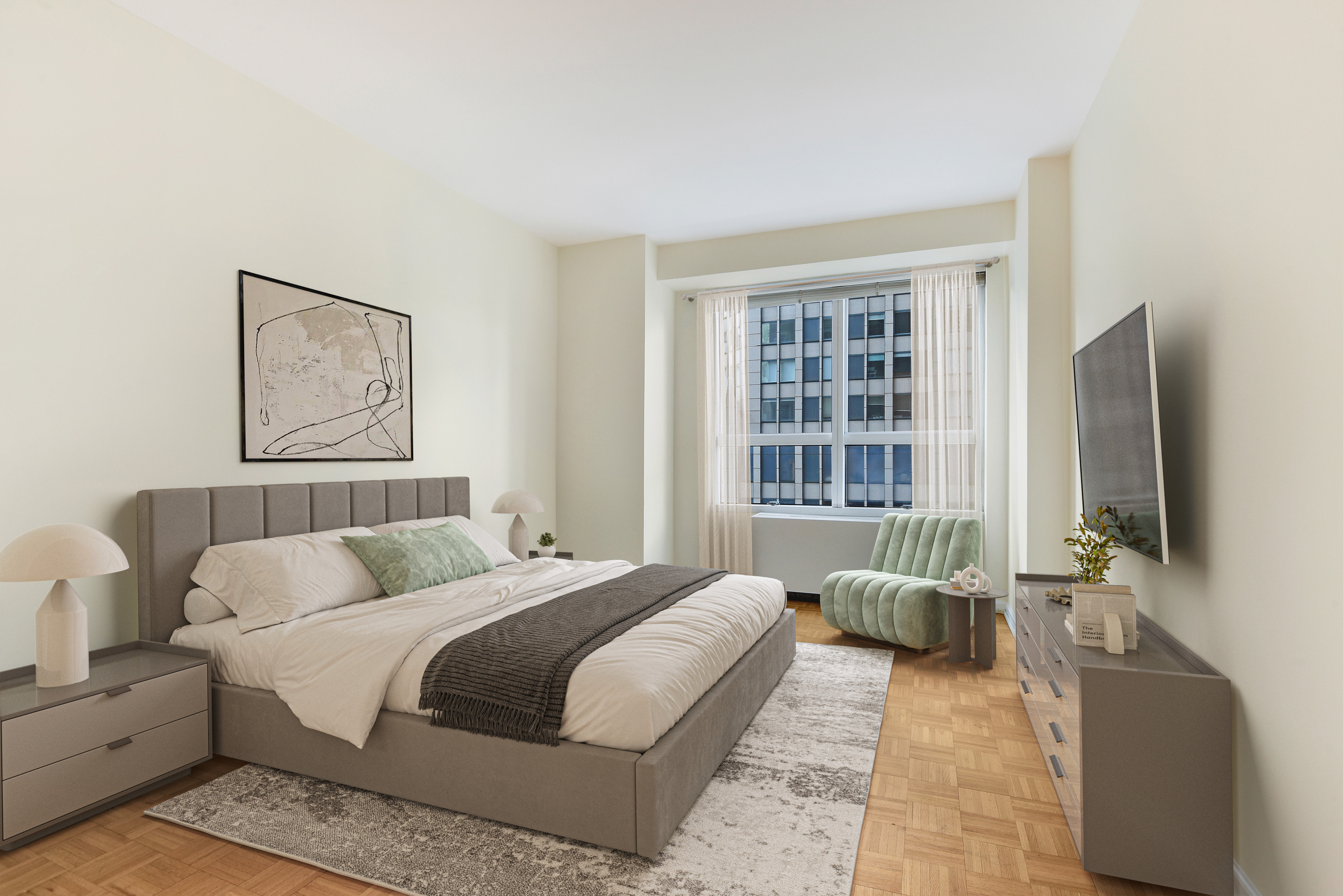 146 West 57th Street, Unit 38E Manhattan, NY 10019 - Photo 3 of 16 a bedroom with a large bed couch and a flat tv screen on a dresser