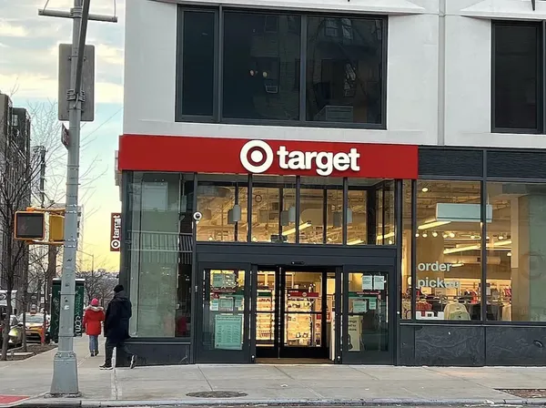a view of a brick building with a large window