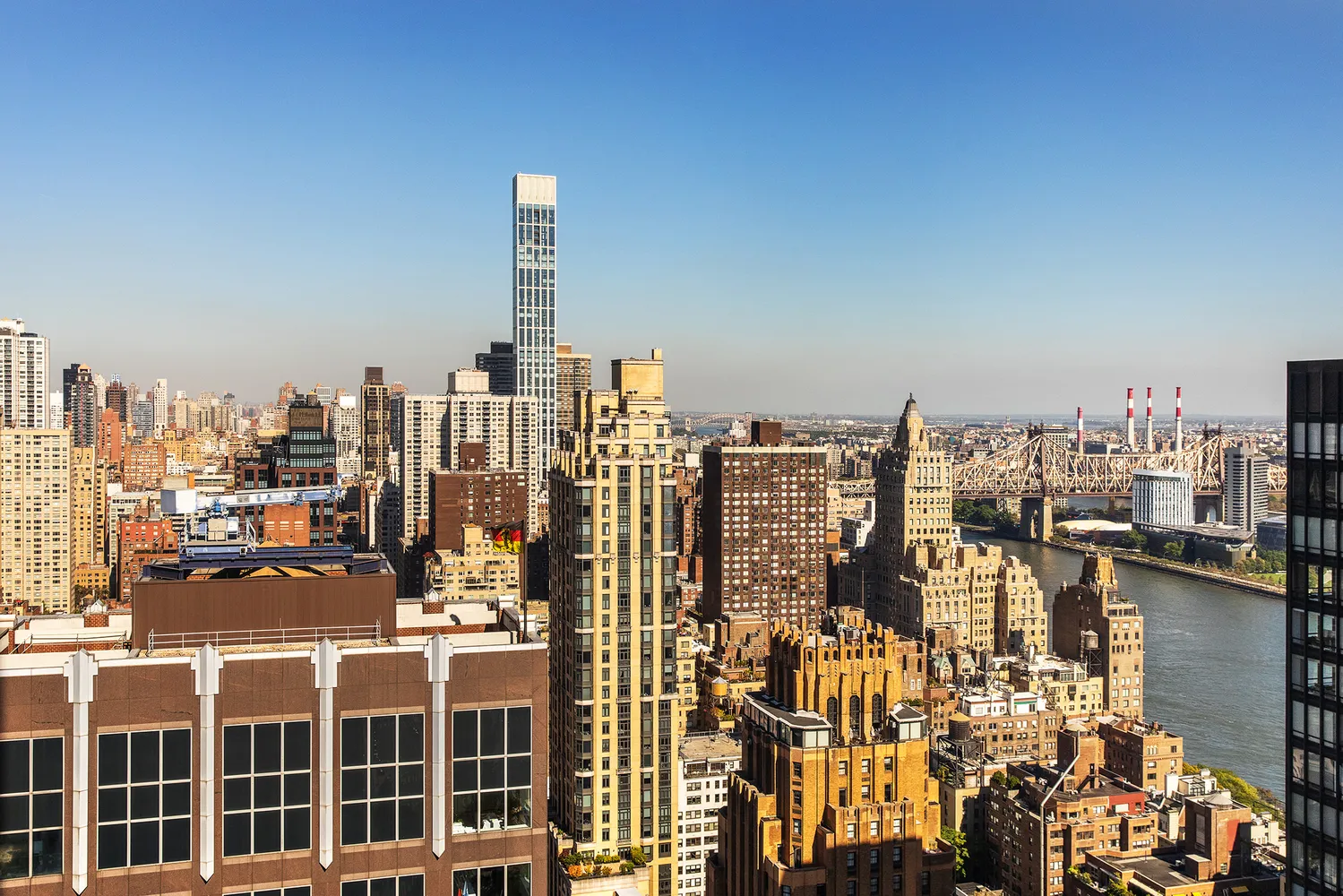 a view of a city with tall buildings
