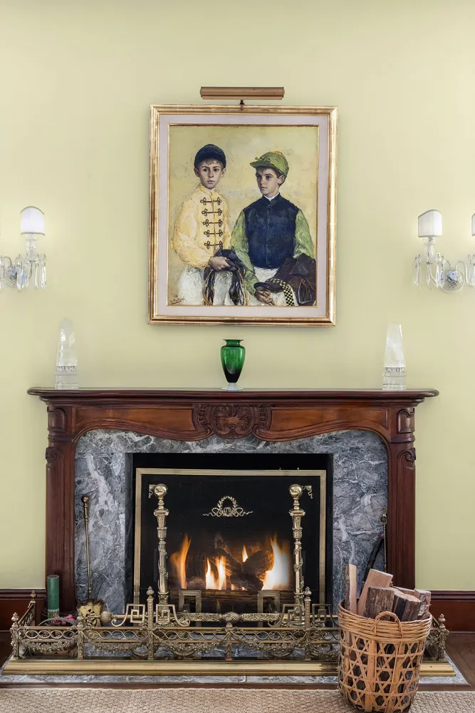 a fireplace with a clock on top of it