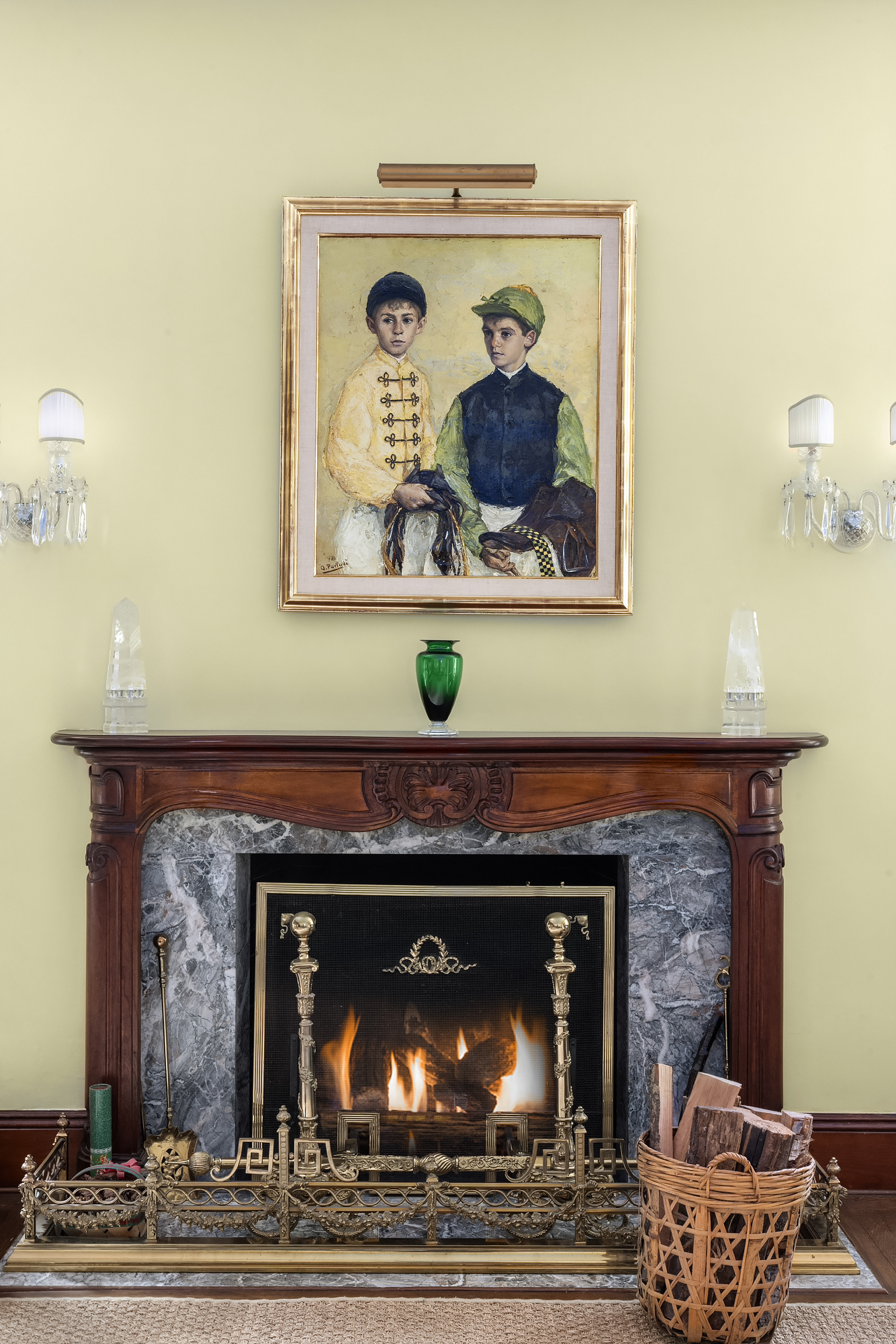 31 East 72nd Street, Unit 7B Manhattan, NY 10021 - Photo 2 of 13 a fireplace with a clock on top of it