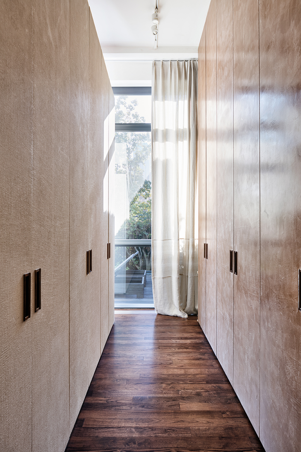 40 Mercer Street, Unit PH7 Manhattan, NY 10013 - Photo 9 of 20 a view of a hallway with wooden floor and staircase