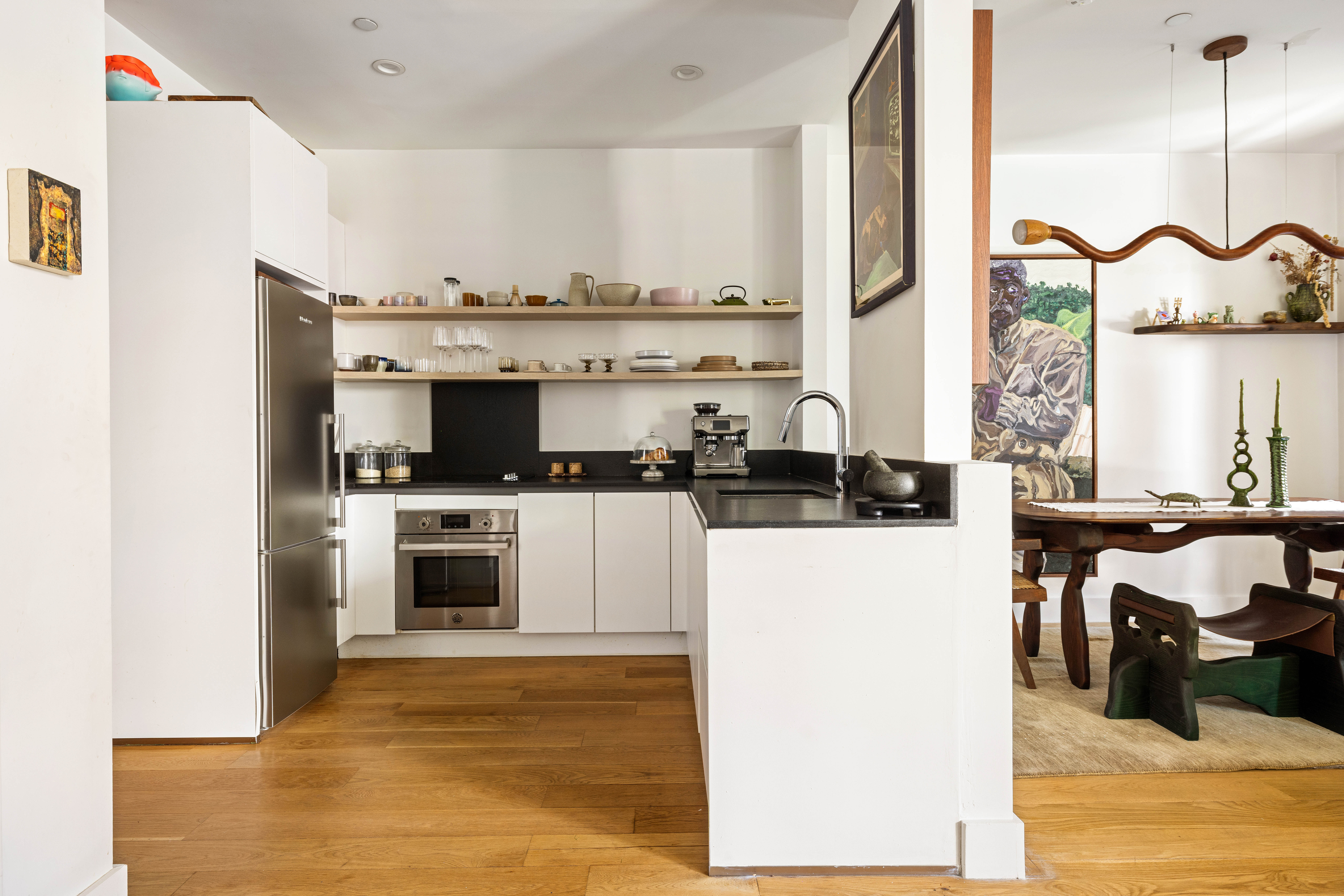 1404 Bushwick Avenue, Unit 1F Brooklyn, NY 11207 - Photo 6 of 18 a view of kitchen with microwave and cabinets