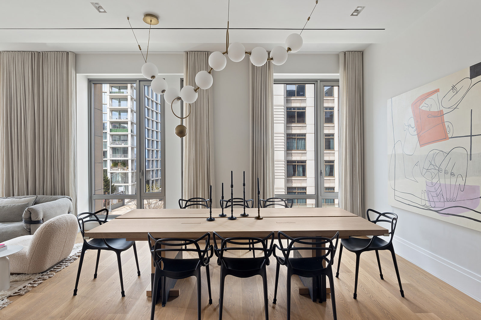 601 Washington Street, Unit 3W Manhattan, NY 10014 - Photo 3 of 15 a dining table with chairs and window