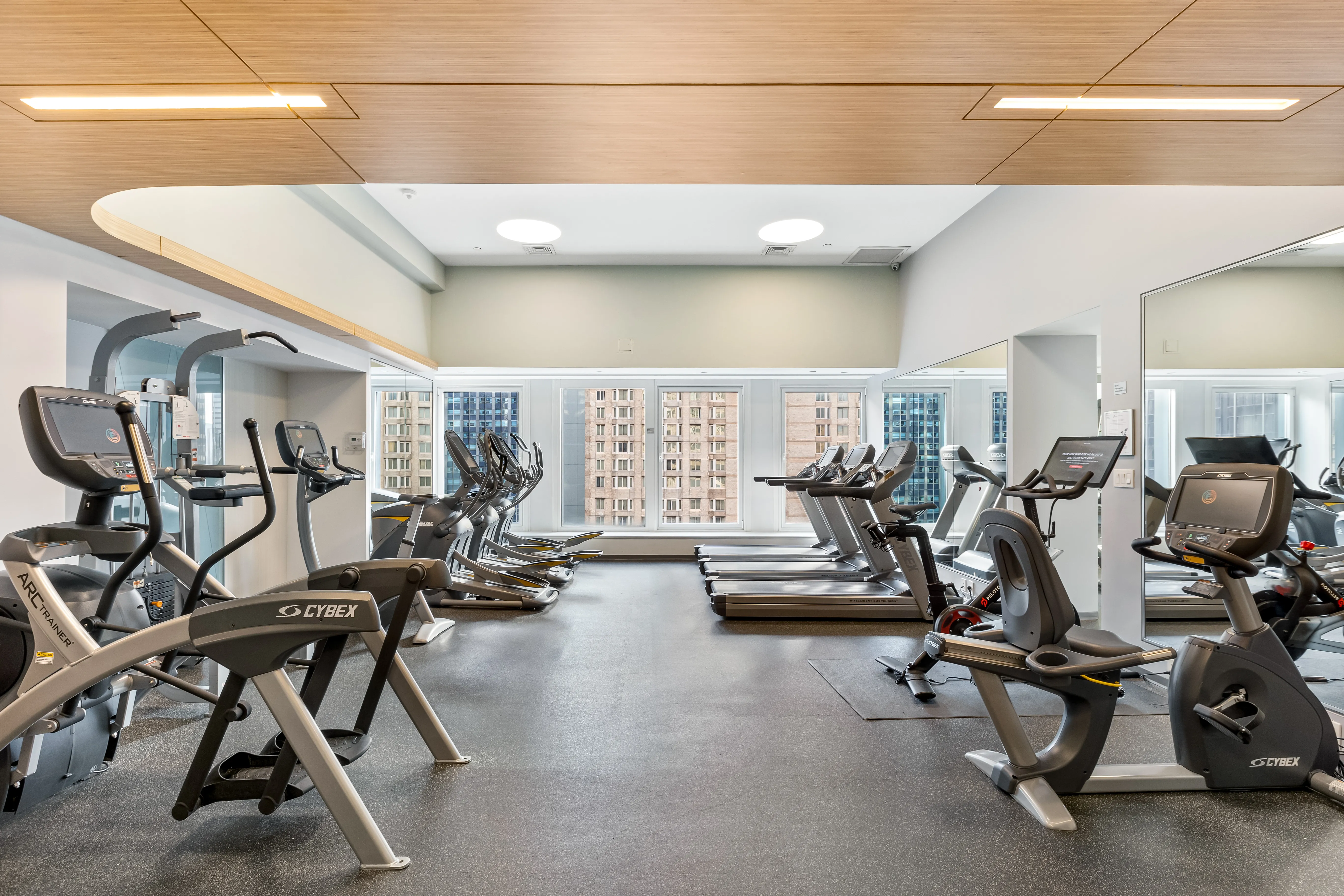 150 West 56th Street, Unit 3901 Manhattan, NY 10019 - Photo 22 of 25 a view of a room with gym equipment
