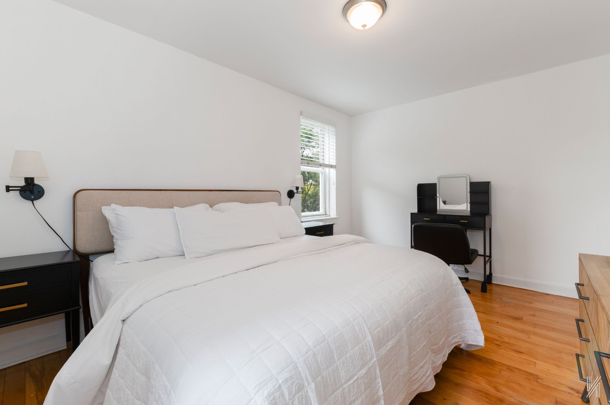 39-55 51st Street, Unit 3G Queens, NY 11377 - Photo 13 of 18 a bedroom with a bed and a tv