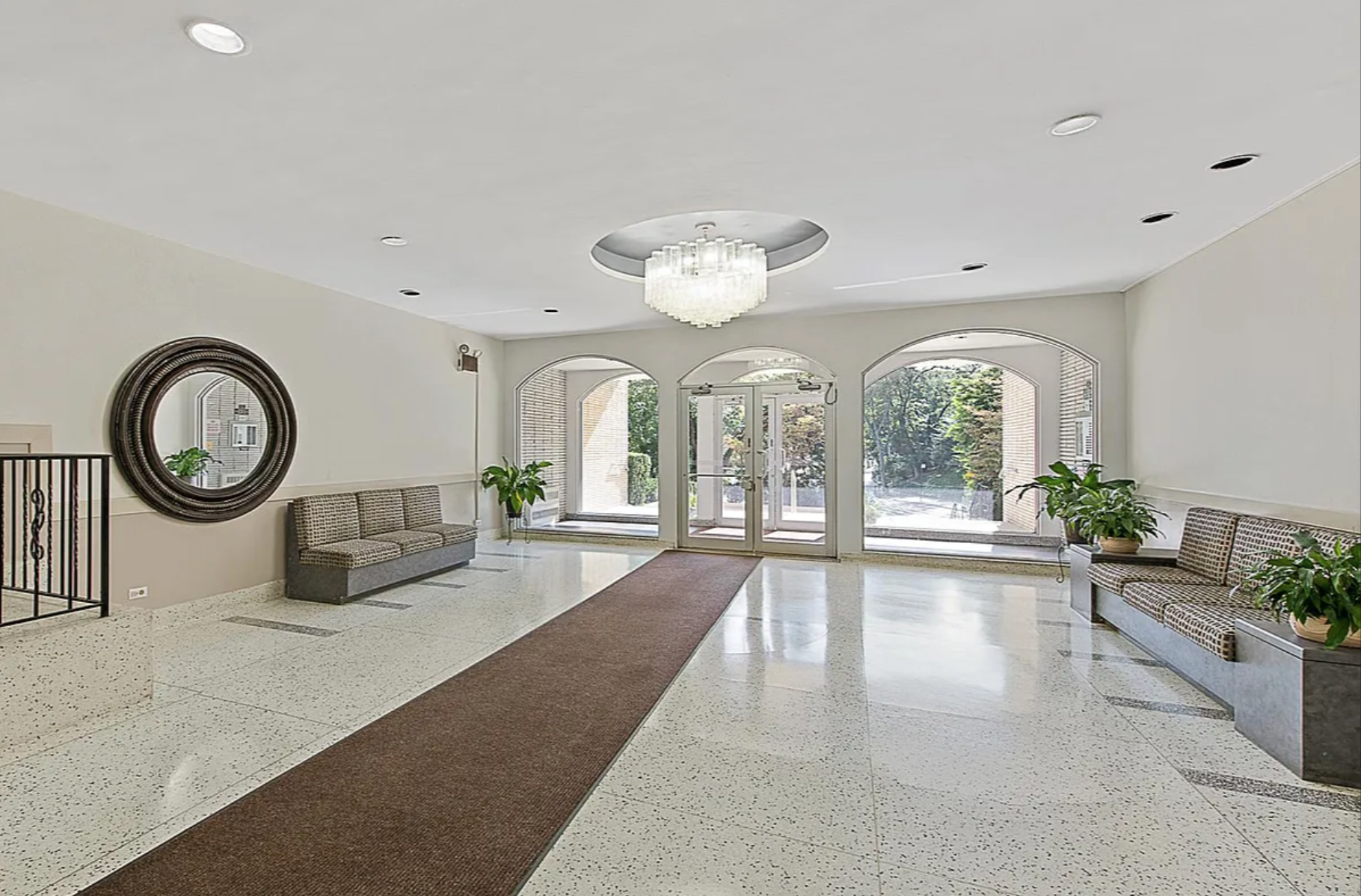 609 Kappock Street, Unit 53 Bronx, NY 10463 - Photo 20 of 21 a living room with furniture and a large window