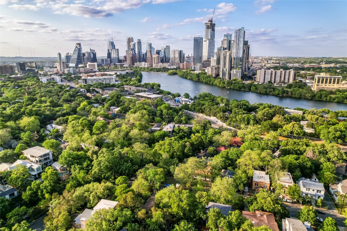 803 Rutherford Place Austin, TX 78704 - Photo 3 of 4 a view of a city with buildings and lake