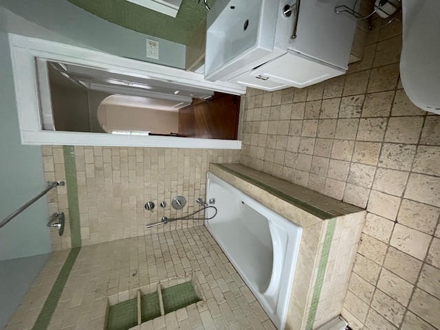 340 Marlborough Road Brooklyn, NY 11226 - Photo 16 of 27 a bathroom with a bathtub and a sink