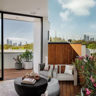 a view of swimming pool with seating area and furniture