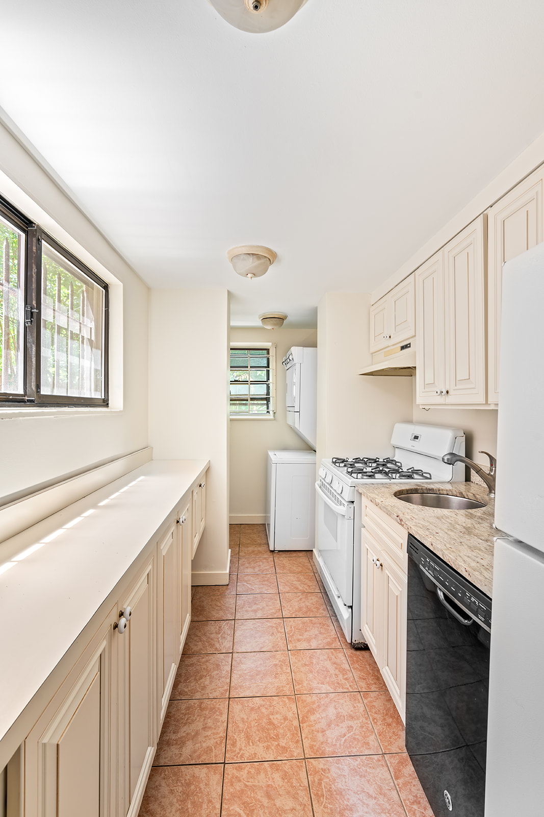 52 South Portland Avenue, Unit 1 Brooklyn, NY 11217 - Photo 2 of 7 a large kitchen with a stove top oven