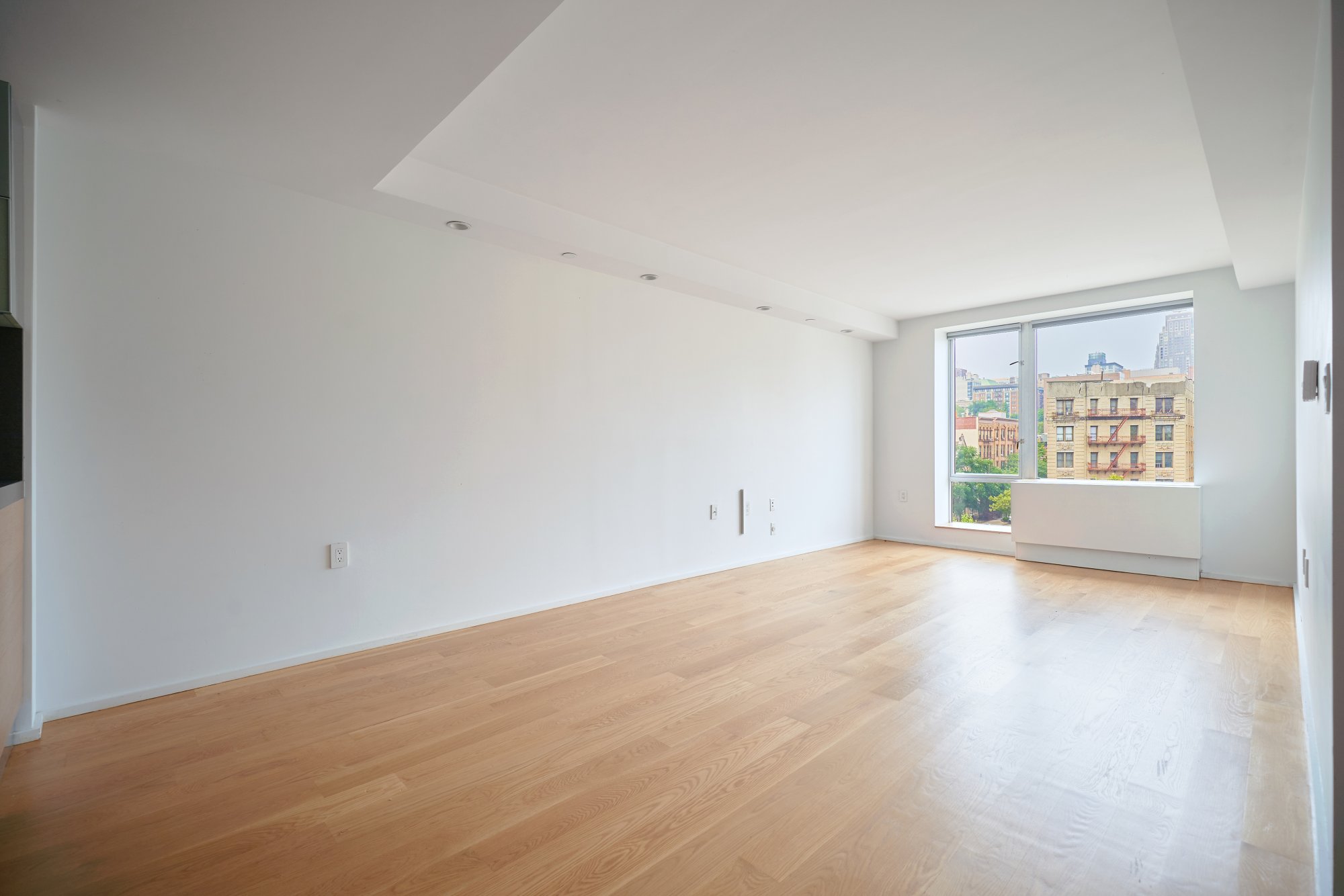 2280 Frederick Douglass Boulevard, Unit 5D Manhattan, NY 10027 - Photo 8 of 22 an empty room with windows