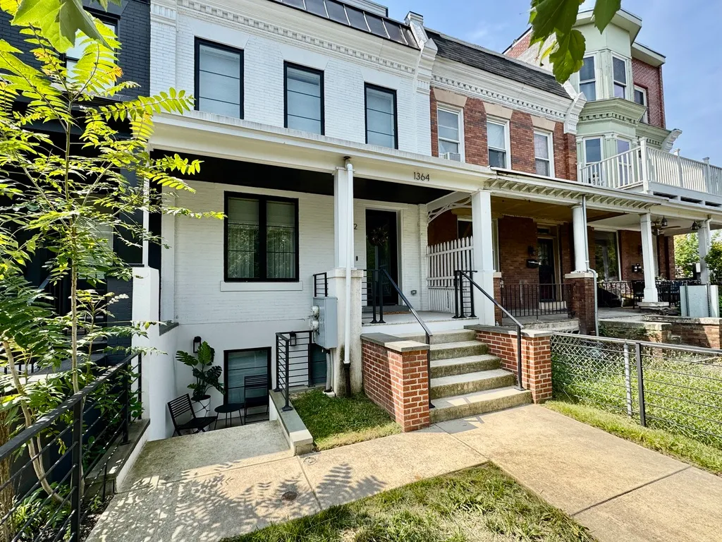 a view of a building with a porch