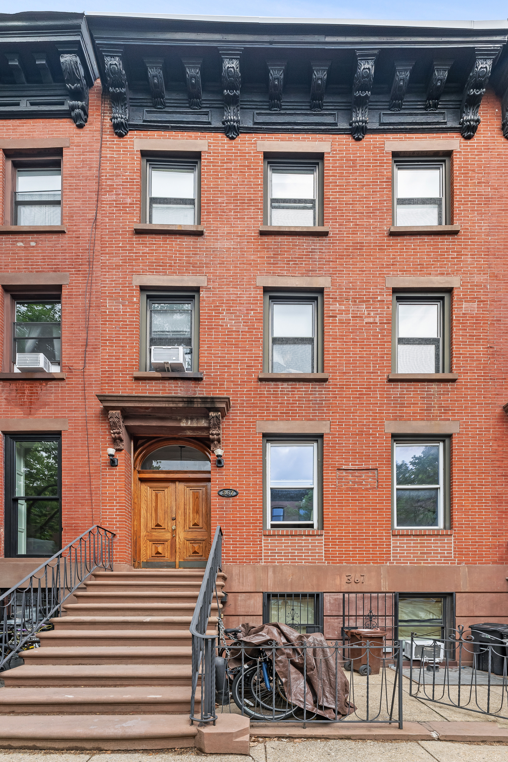 367 Degraw Street, Unit 2 Brooklyn, NY 11231 - Photo 6 of 7 a front view of a building with many windows