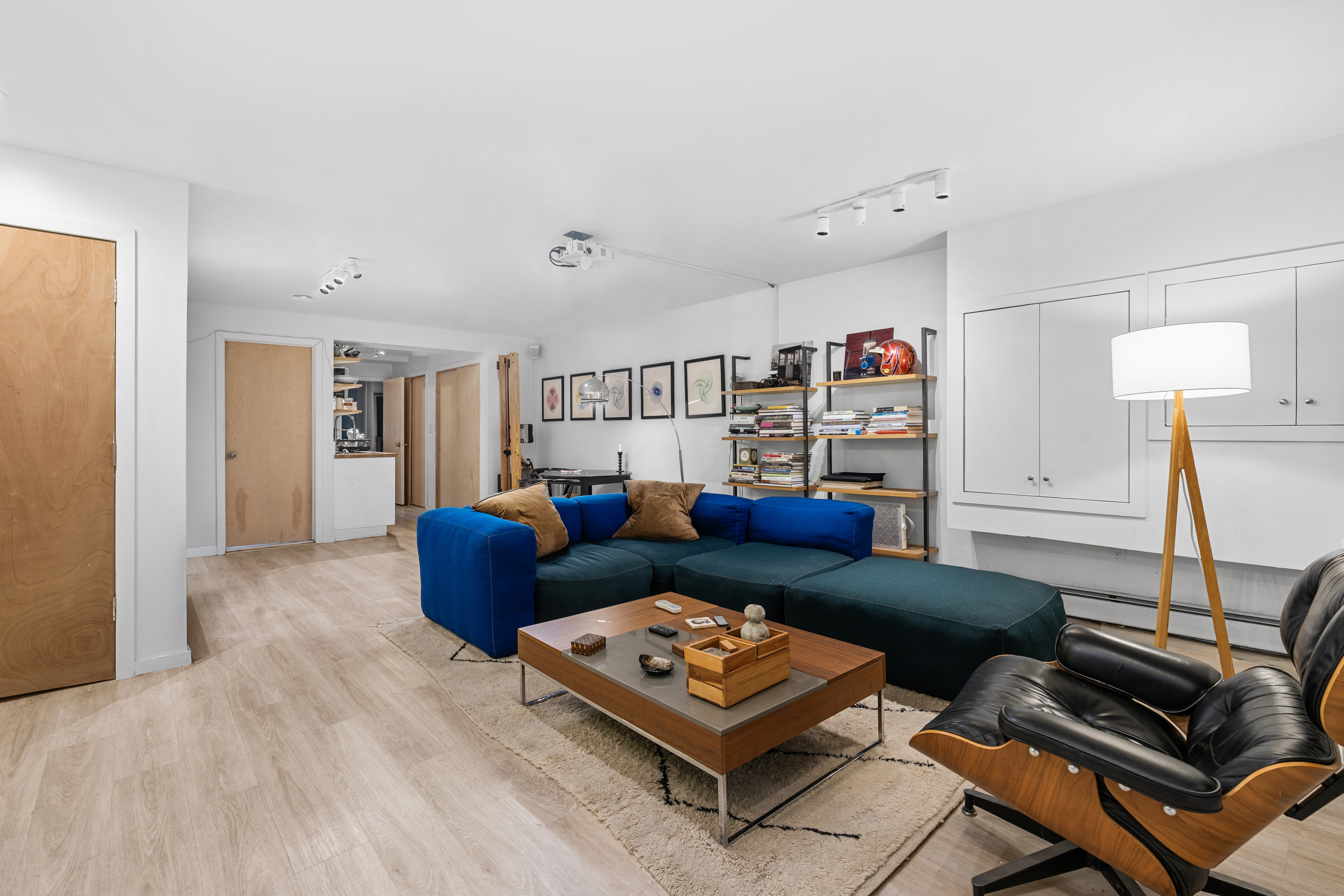 660 Saint Marks Avenue Brooklyn, NY 11216 - Photo 18 of 21 a living room with furniture and a wooden floor