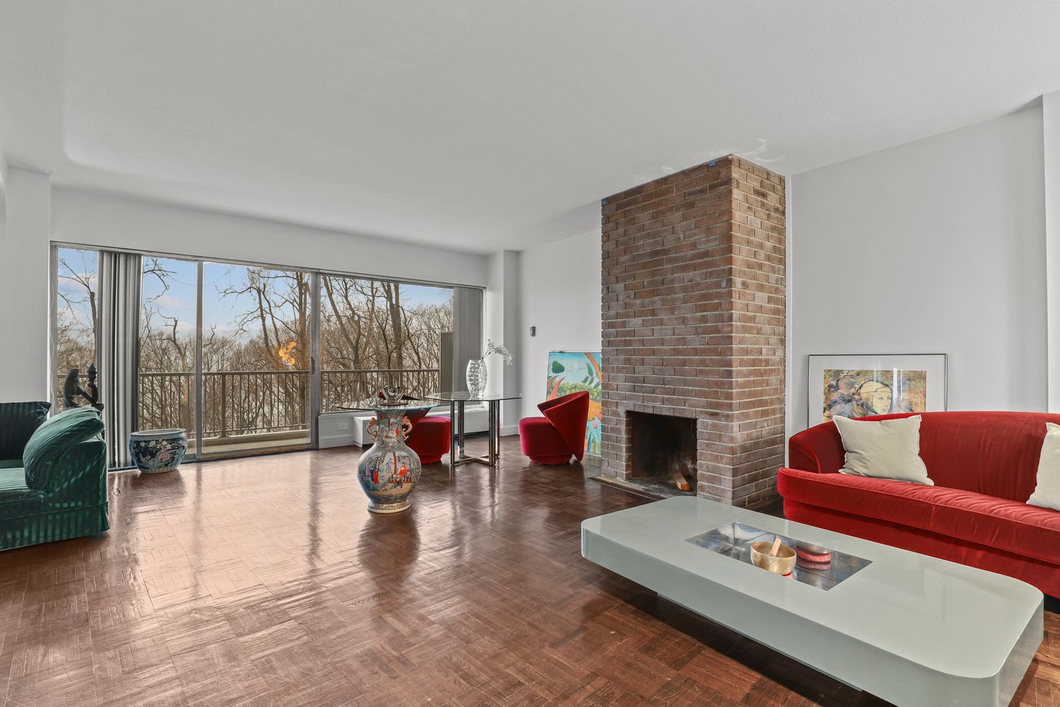 4455 Douglas Avenue, Unit 3FE Bronx, NY 10471 - Photo 11 of 53 a living room with furniture fireplace and a large window