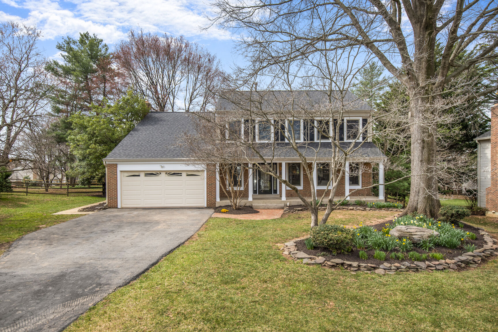 4008 Evangeline Terrace Olney, MD 20832 - Photo 1 of 54 a front view of a house with garden