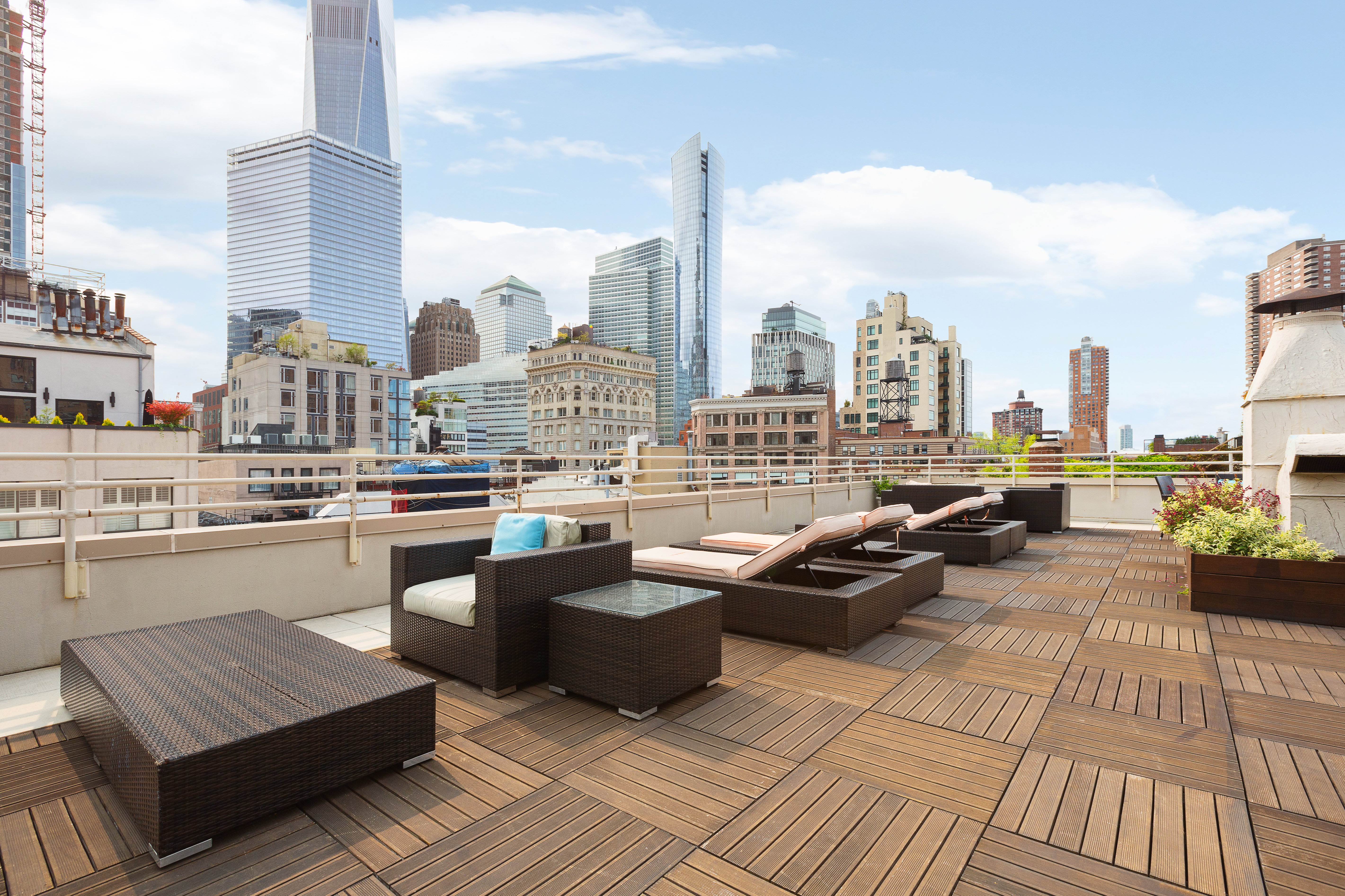 100 Reade Street, Unit 6CD Manhattan, NY 10013 - Photo 24 of 26 a view of a balcony with chairs and wooden floor