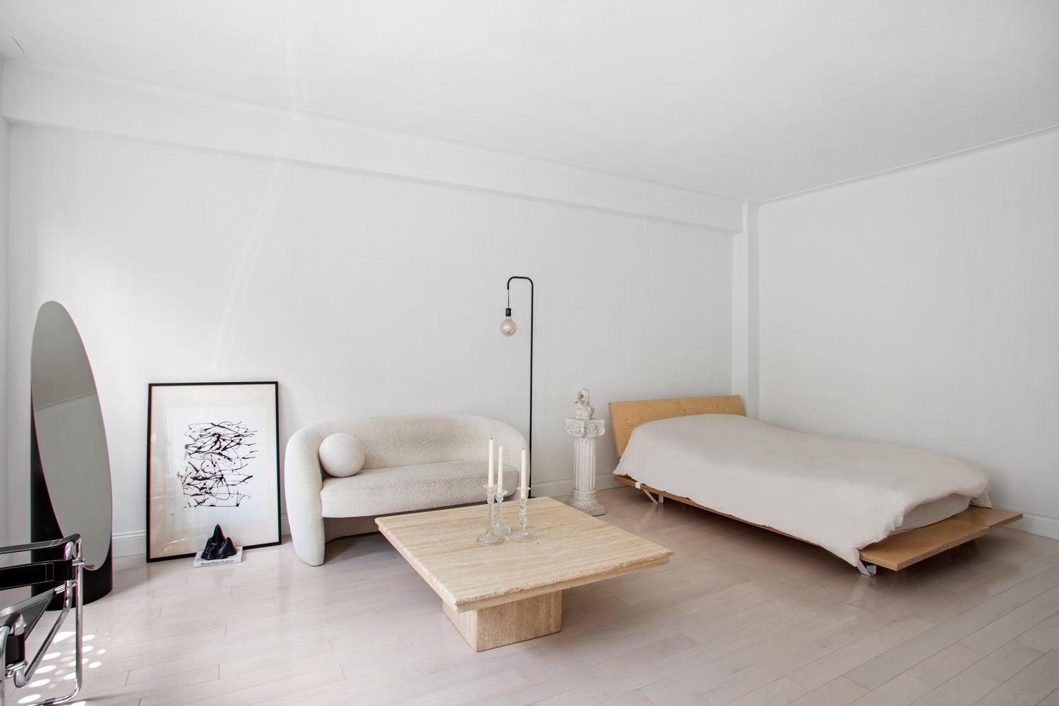 129 West 89th Street, Unit 45 Manhattan, NY 10024 - Photo 3 of 6 a bedroom with furniture and a window