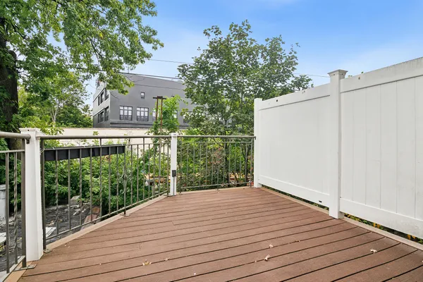 a view of a backyard of the house