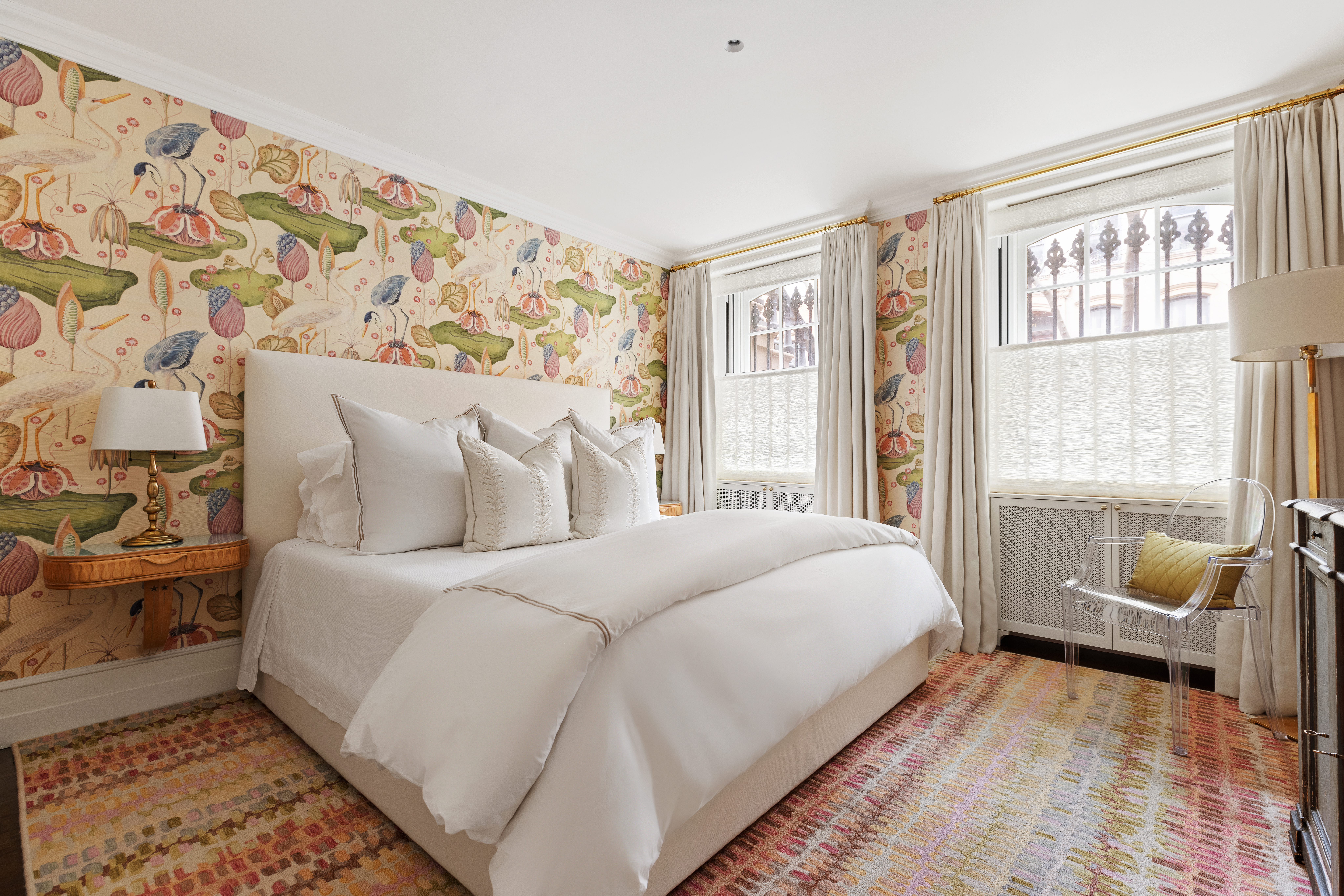 72 Perry Street, Unit GARDEN Manhattan, NY 10014 - Photo 5 of 15 a bedroom with a bed and wooden floor