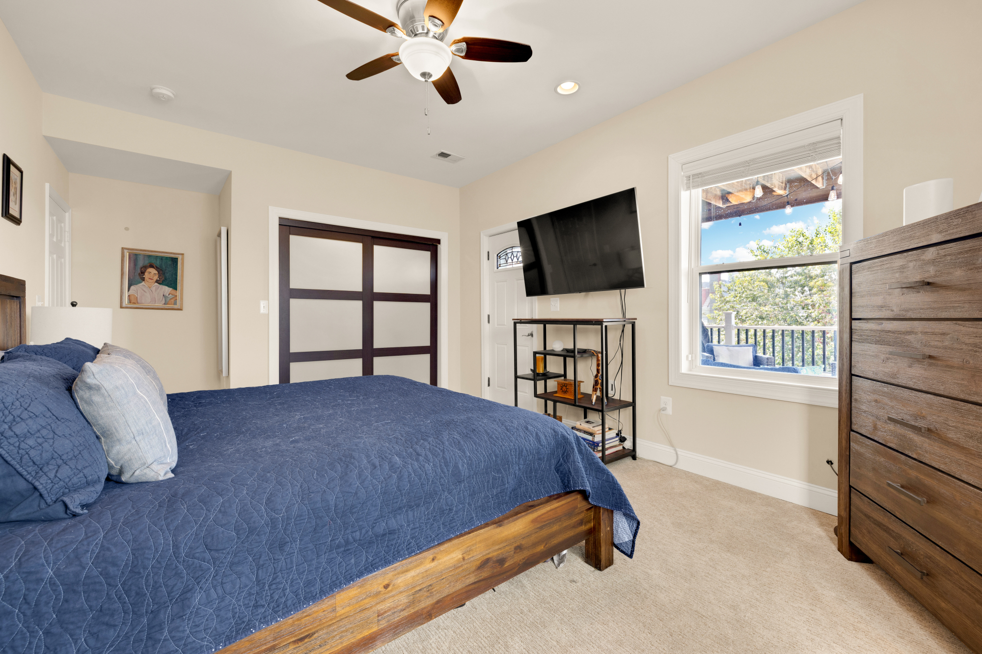 233 S Street Northeast, Unit 4 Washington, DC 20002 - Photo 30 of 37 a bedroom with a bed and a flat screen tv