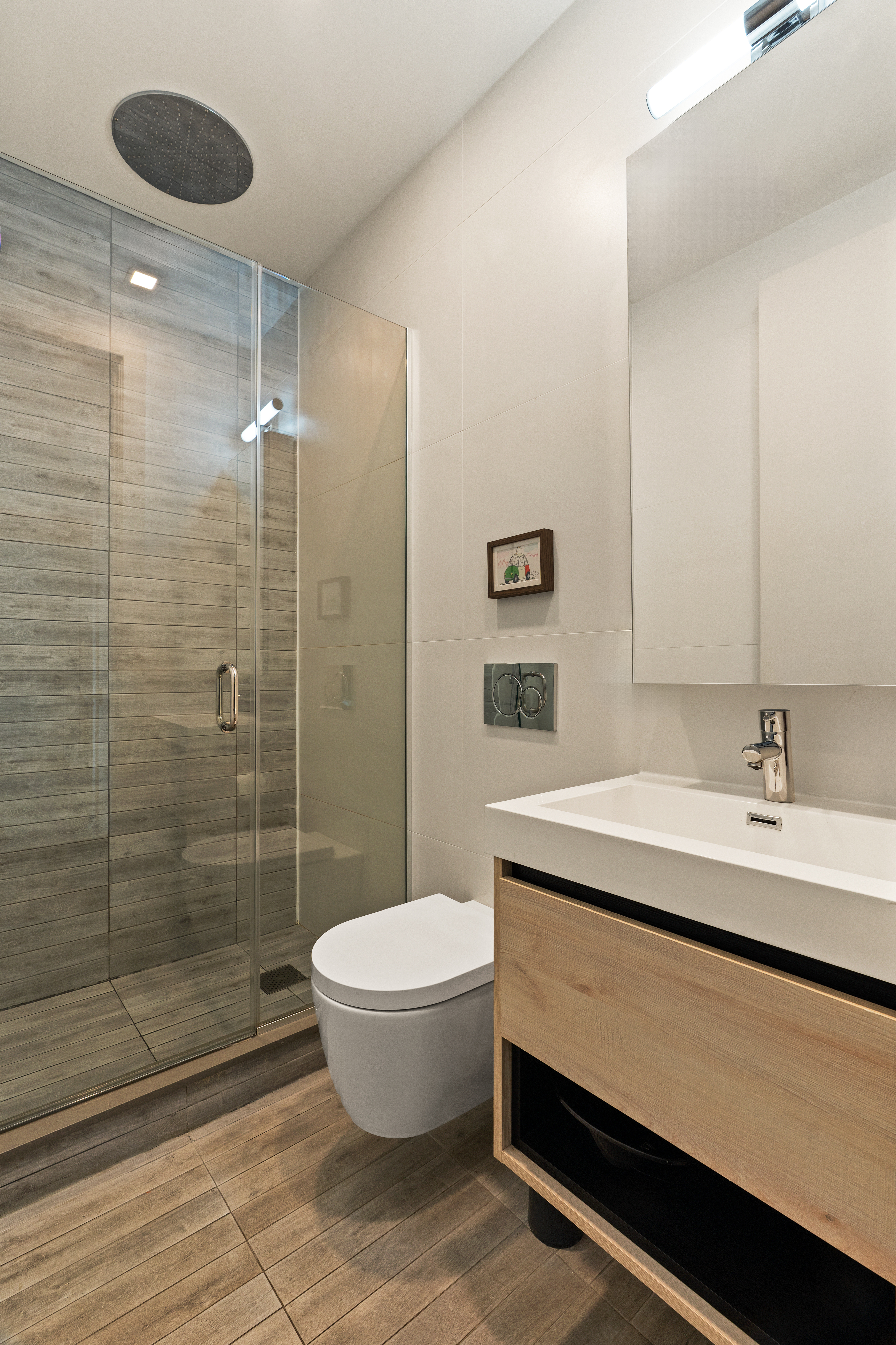 1230 Bedford Avenue, Unit 3R Brooklyn, NY 11216 - Photo 12 of 13 a bathroom with a sink toilet and shower