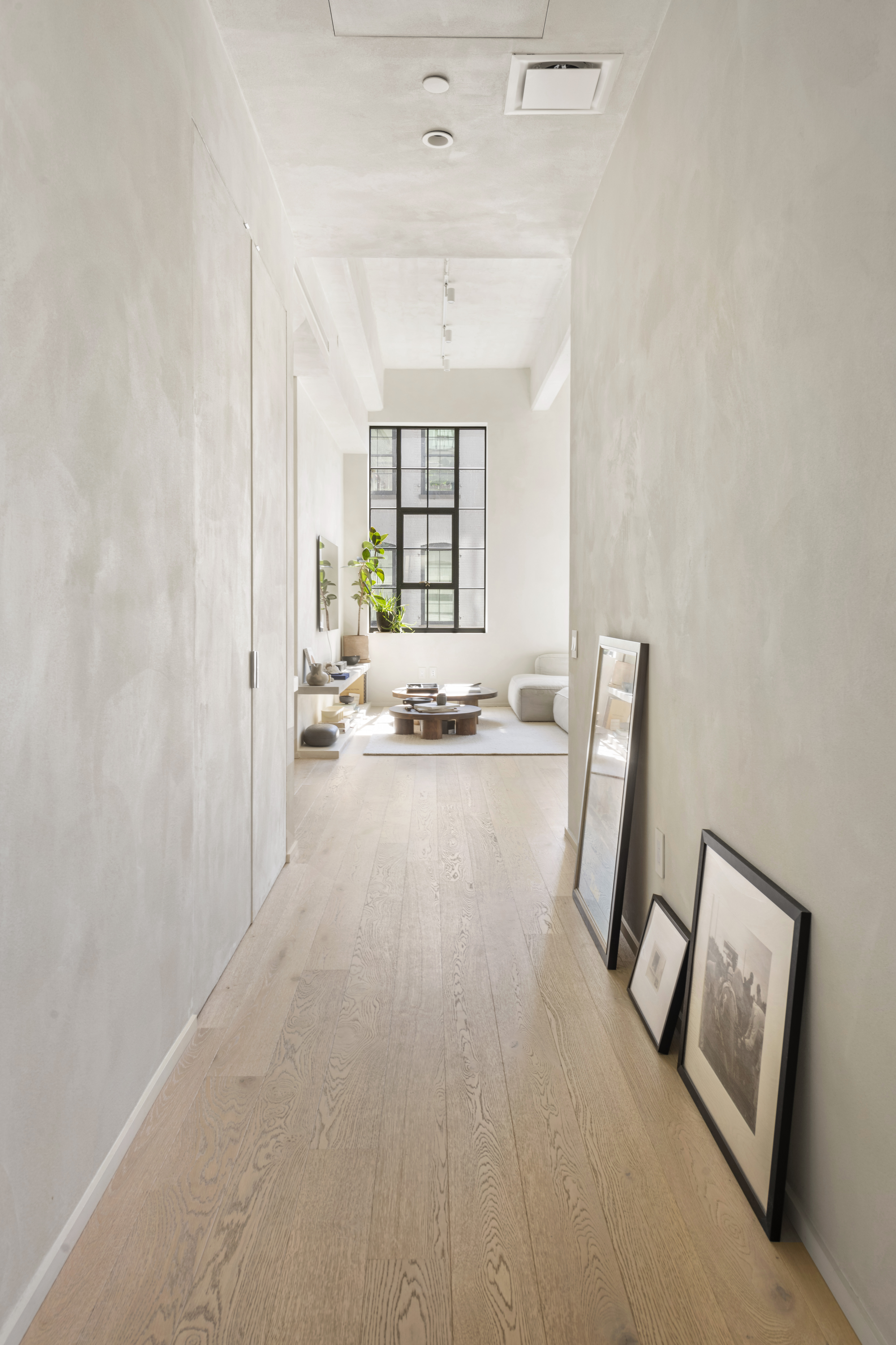 168 Plymouth Street, Unit 5A Brooklyn, NY 11201 - Photo 7 of 19 a view of a livingroom with furniture and wooden floor
