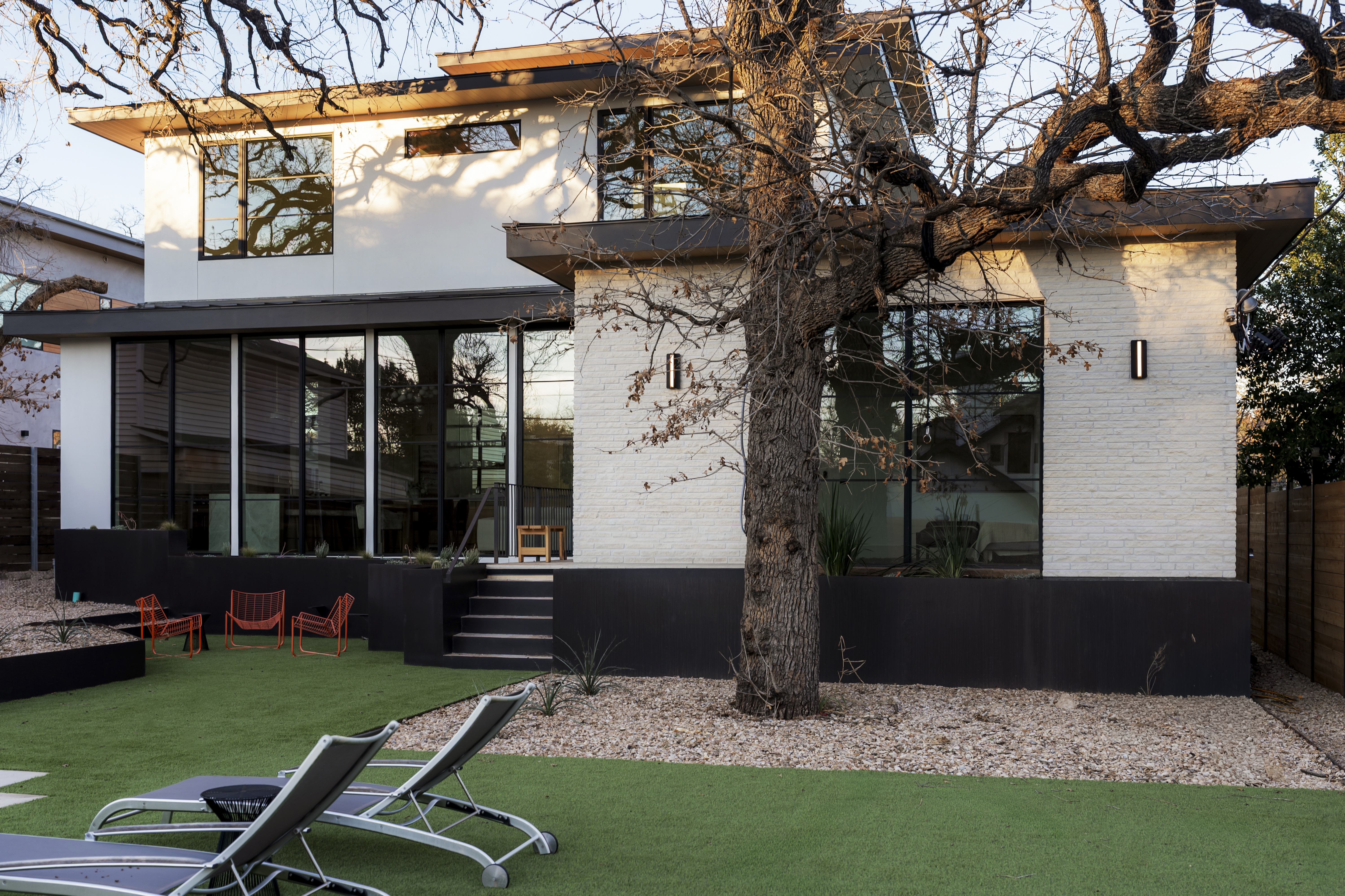 3411 Bridle Path Austin, TX 78703 - Photo 54 of 76 a view of backyard with table and chairs and potted plants