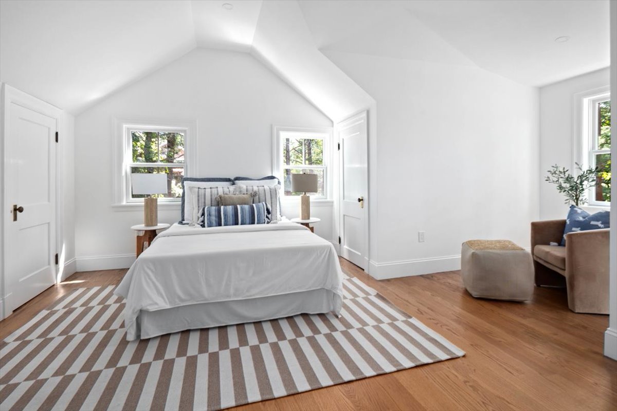 49 Garrison Road Hingham, MA 02043 - Photo 21 of 30 a bedroom with a bed and wooden floor